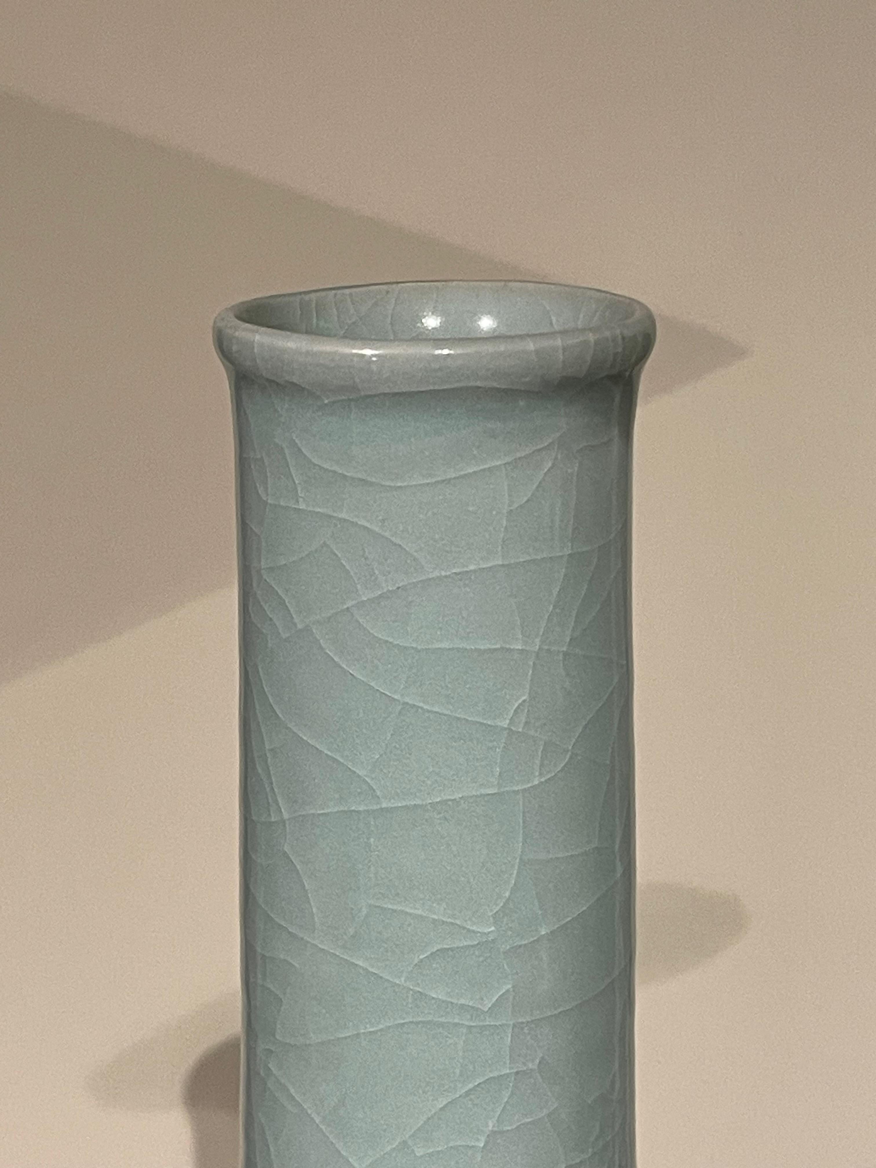 Contemporary Chinese pale turquoise vase.
Funnel neck design.
Large collection available with varying sizes and shapes.
ARRIVING APRIL
