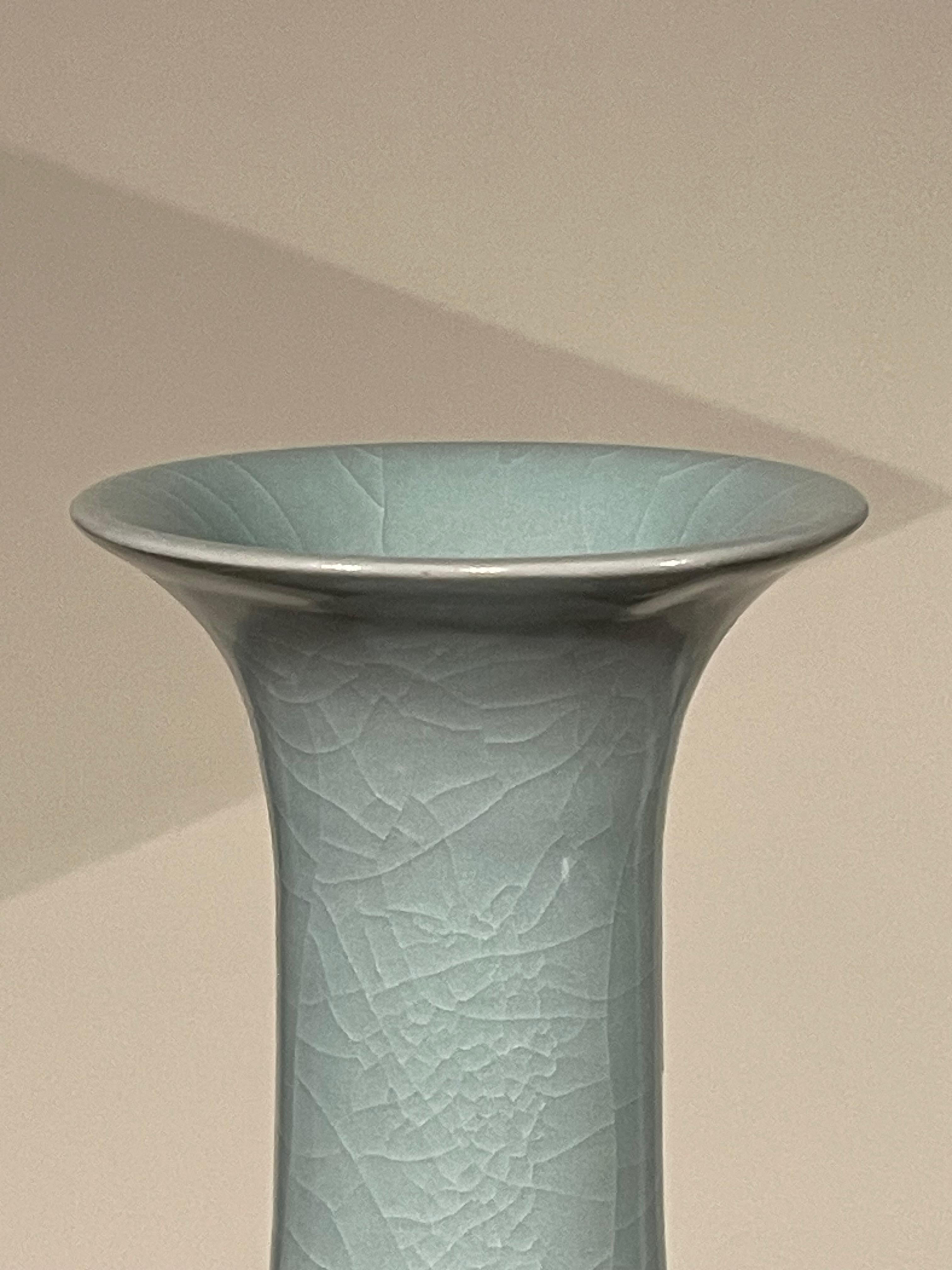 Contemporary Chinese pale turquoise vase.
Tulip shape with rounded bottom.
Large collection available with varying sizes and shapes.
Sold individually.
ARRIVING MARCH