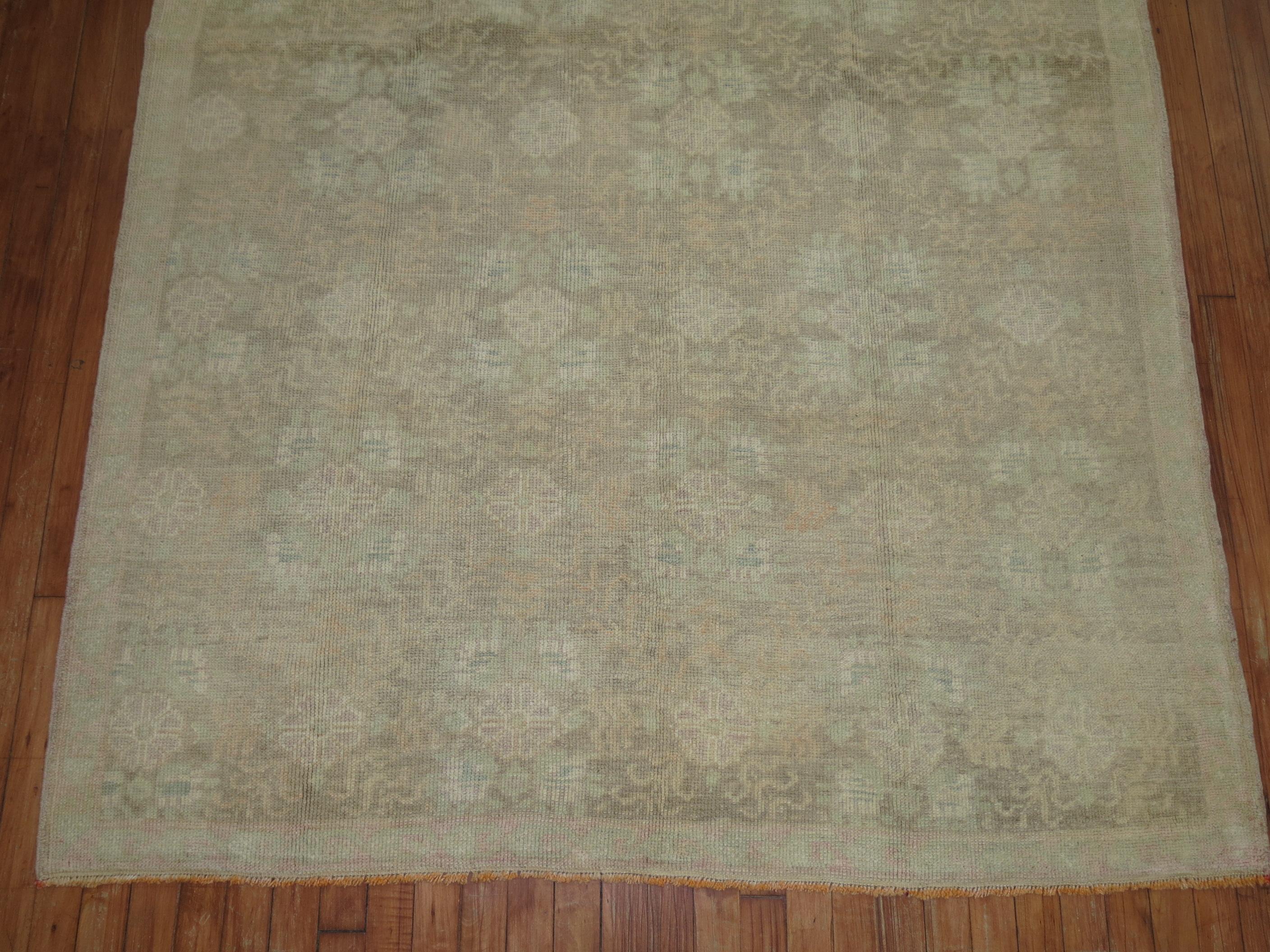 A lovely Turkish Oushak with a soft, muted all-over floral design.