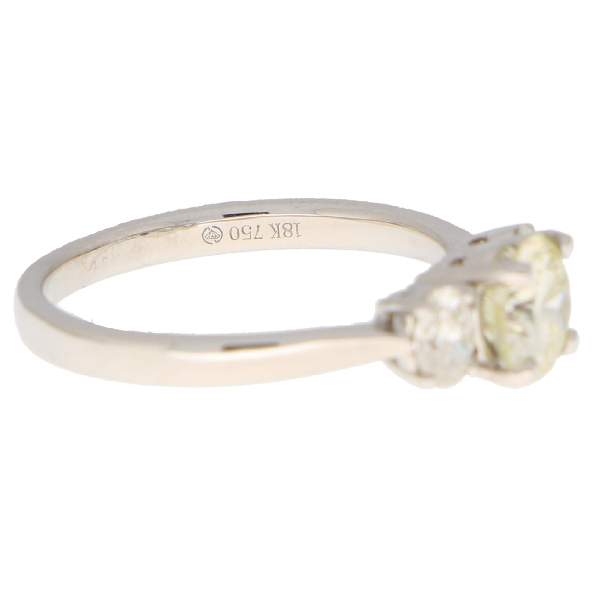 Modern Pale Yellow Diamond Three Stone Engagement Ring Set in 18k White Gold