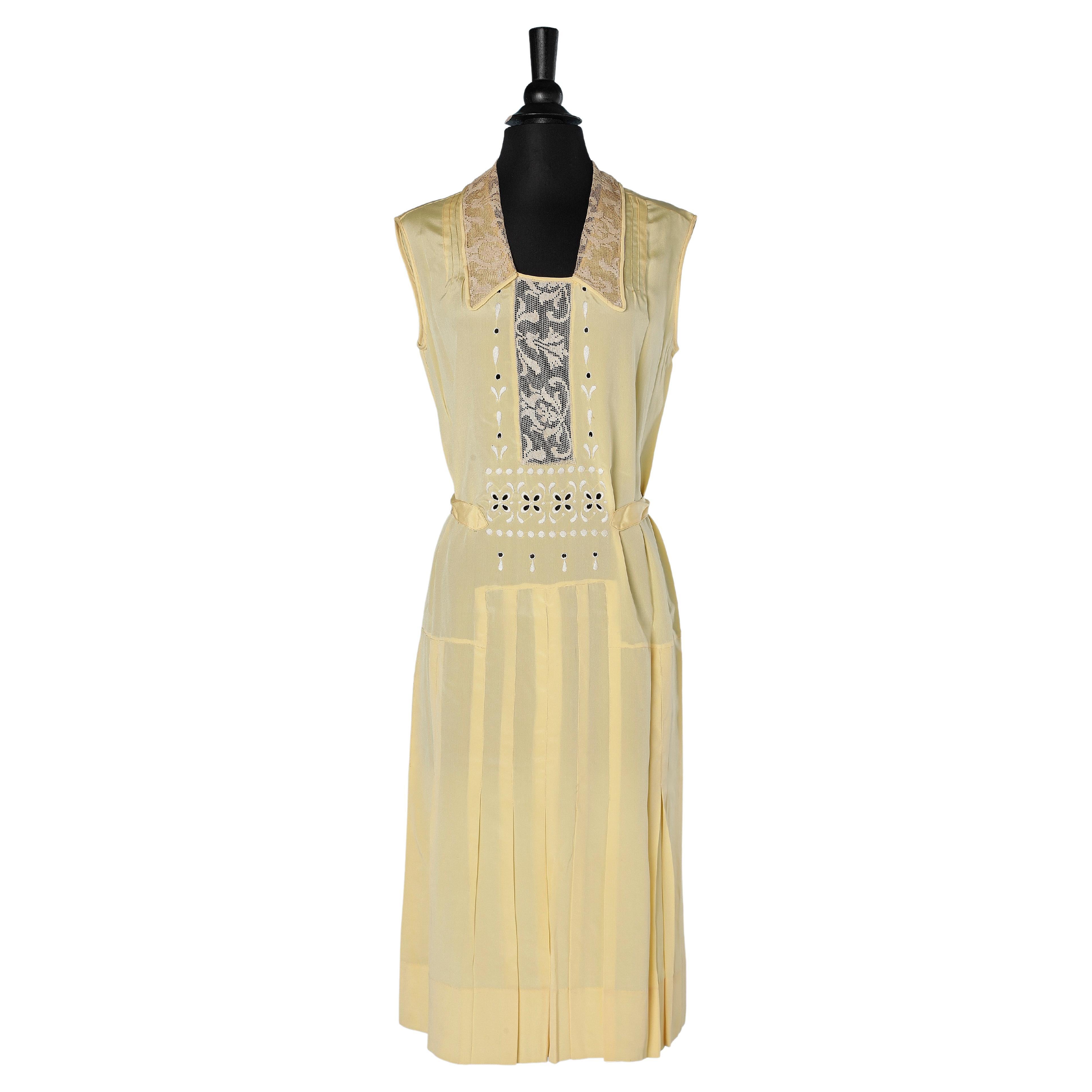 Pale yellow silk dress with lace appliqué and ivory silk thread Circa 1920