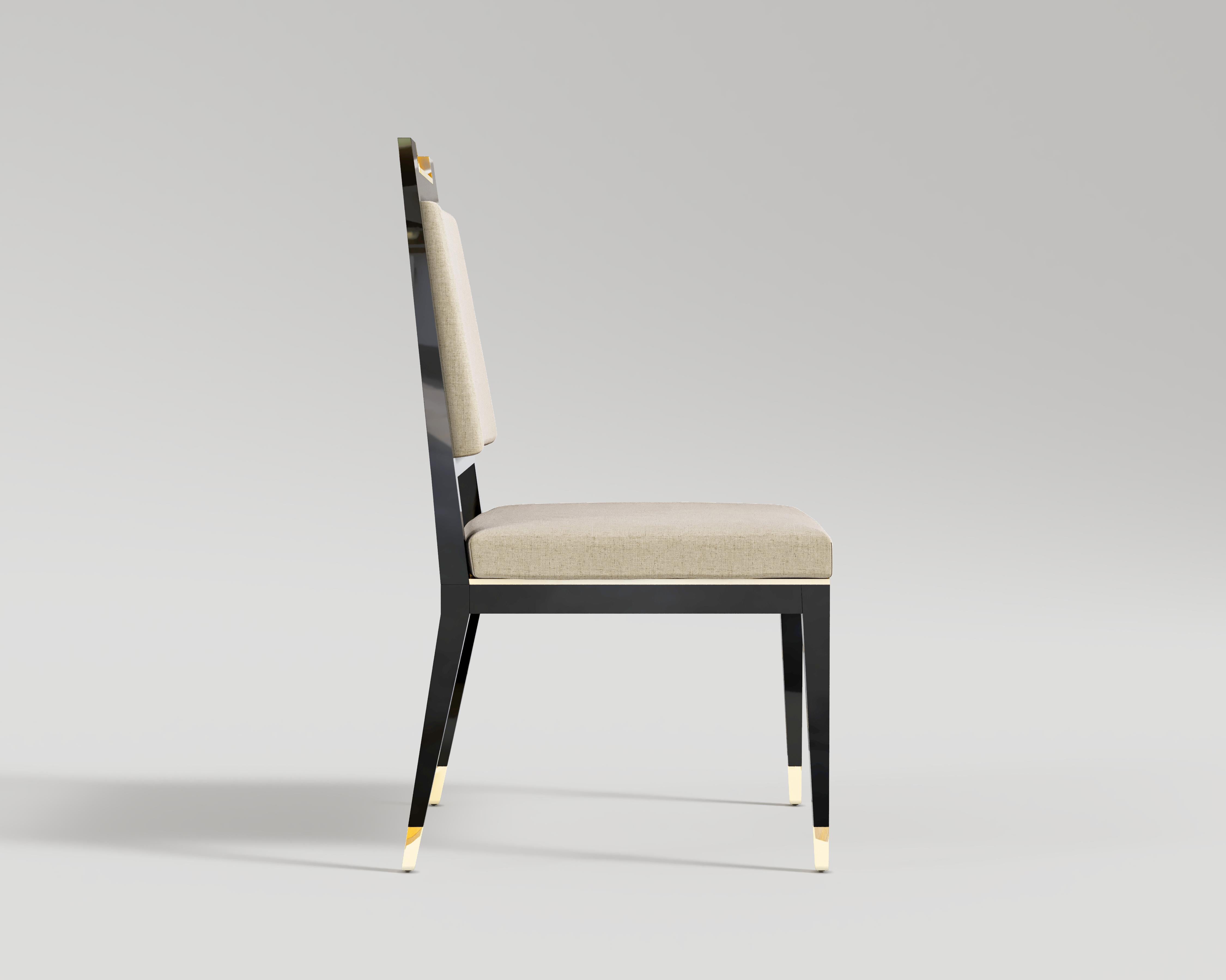 Palena Chair
The Palena Dining Chair is a great example of luxury and ease. This chair is a paean to the Art Deco period, designed to introduce sophistication into any dining room.

The frame is made of black-lacquered metal, very firm and shining