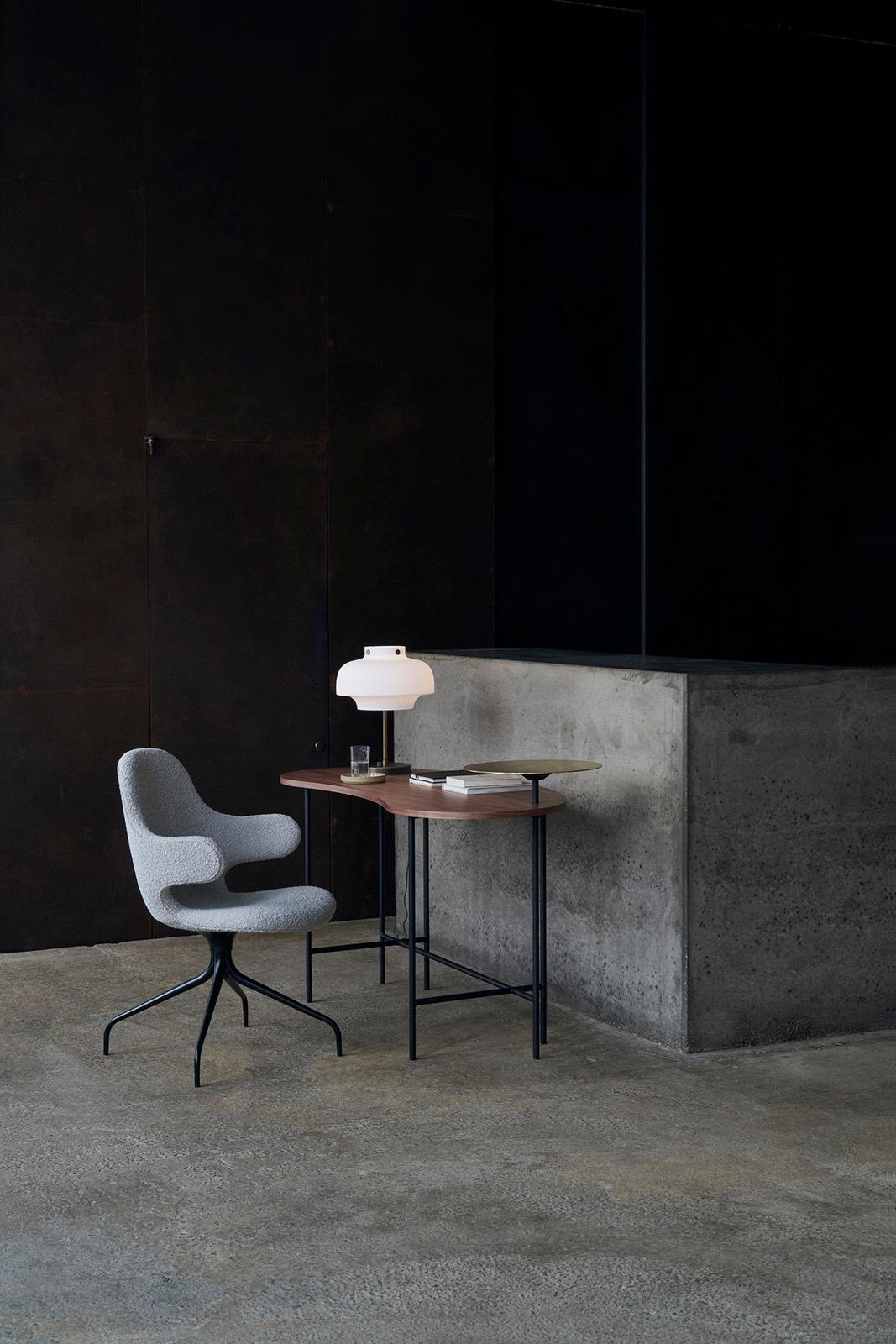 Inspired by Alexander Calder’s kinetic sculptures, Spanish designer Jaime Hayon transformed the idea of a mobile into a table - stabilised by a metal armature.
This Palette Desk is made from Brass and Lacquered Walnut tops and the base is made from