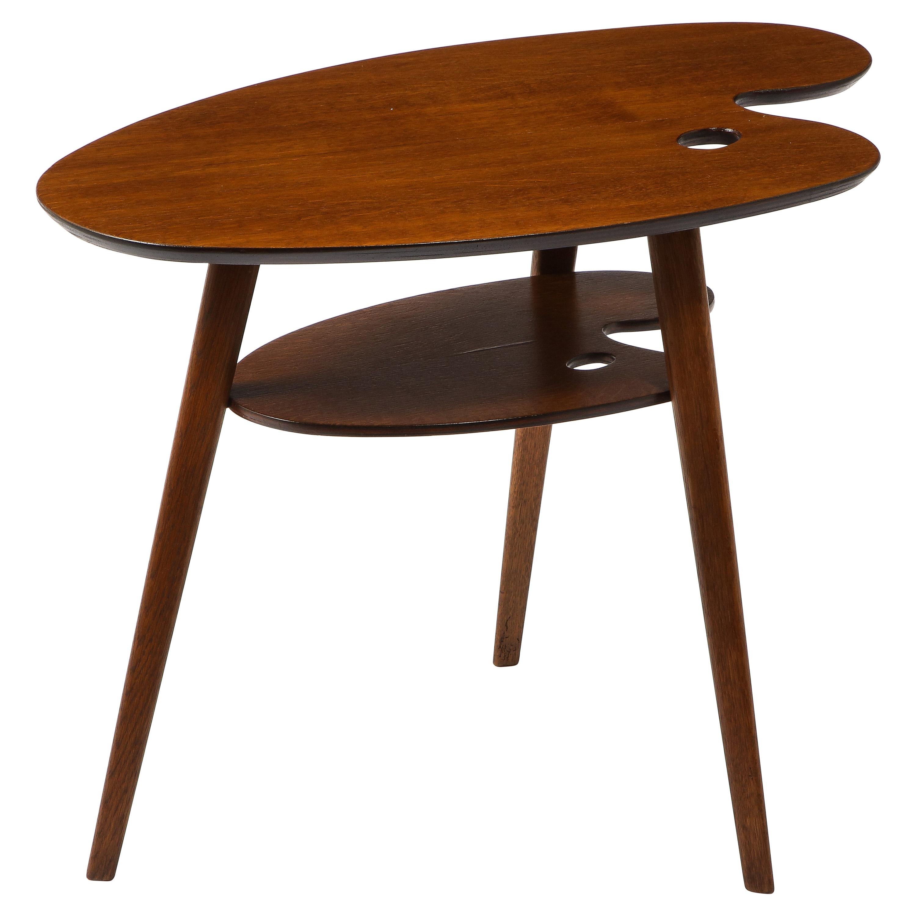 A staple of French midcentury design, the Palette shaped table is emblematic of the era. 
