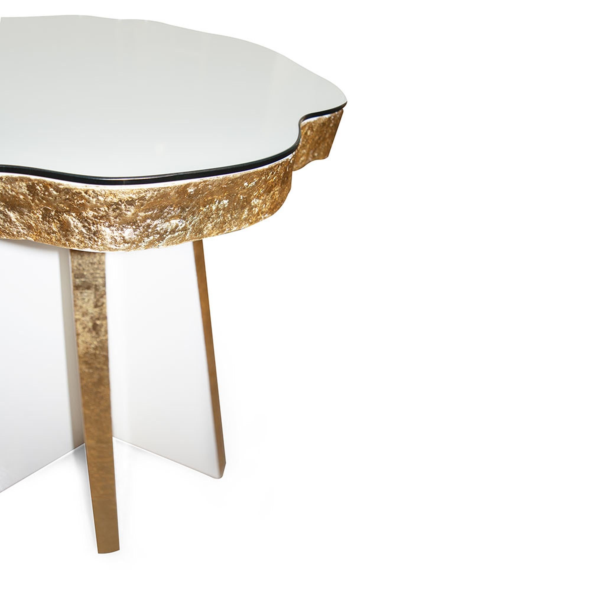 The Palisades accent table I draws attention at rust glance, with its unique and charming design. A smooth top juxtaposed with a concrete, irregular-shaped edge is enveloped in a lacquered finish for a beautiful effect distinctive to this piece. The
