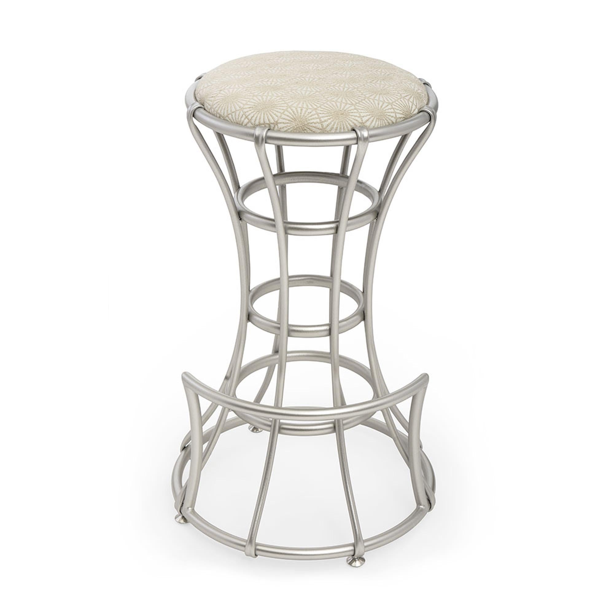 With an unlikely arrangement of feminine and industrial elements, the Palisades bar stool is a gorgeous piece unlike any other. The curved metal base was inspired by the bodice of an antique dress form, and is accented with inner support rings