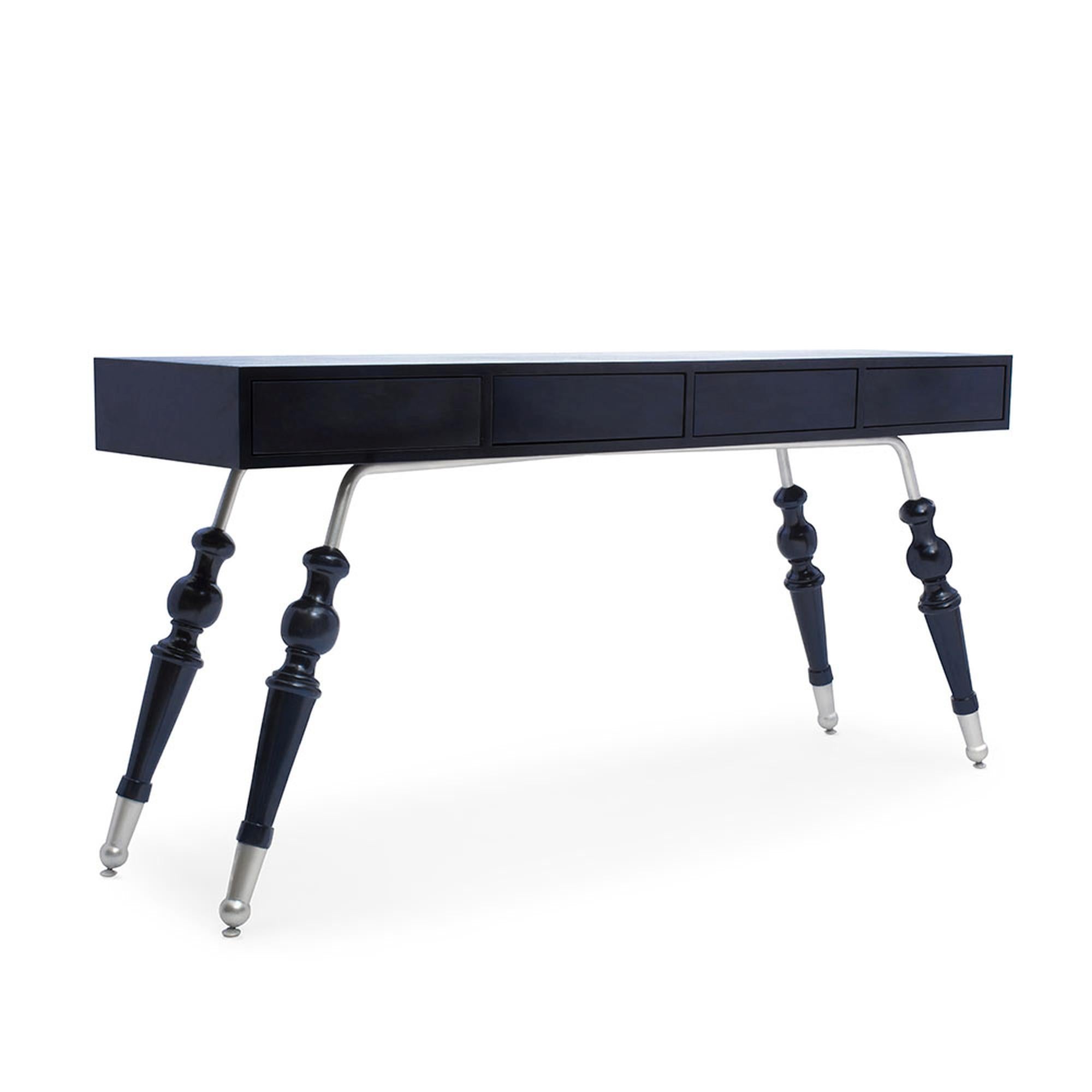 The Palisades console is a true work of art, expertly blending modern silhouettes with traditional elements. Made from solid wood, fionished in a lacquered, rich navy hue, the body of this piece is clean and modern, coating above its turned legs