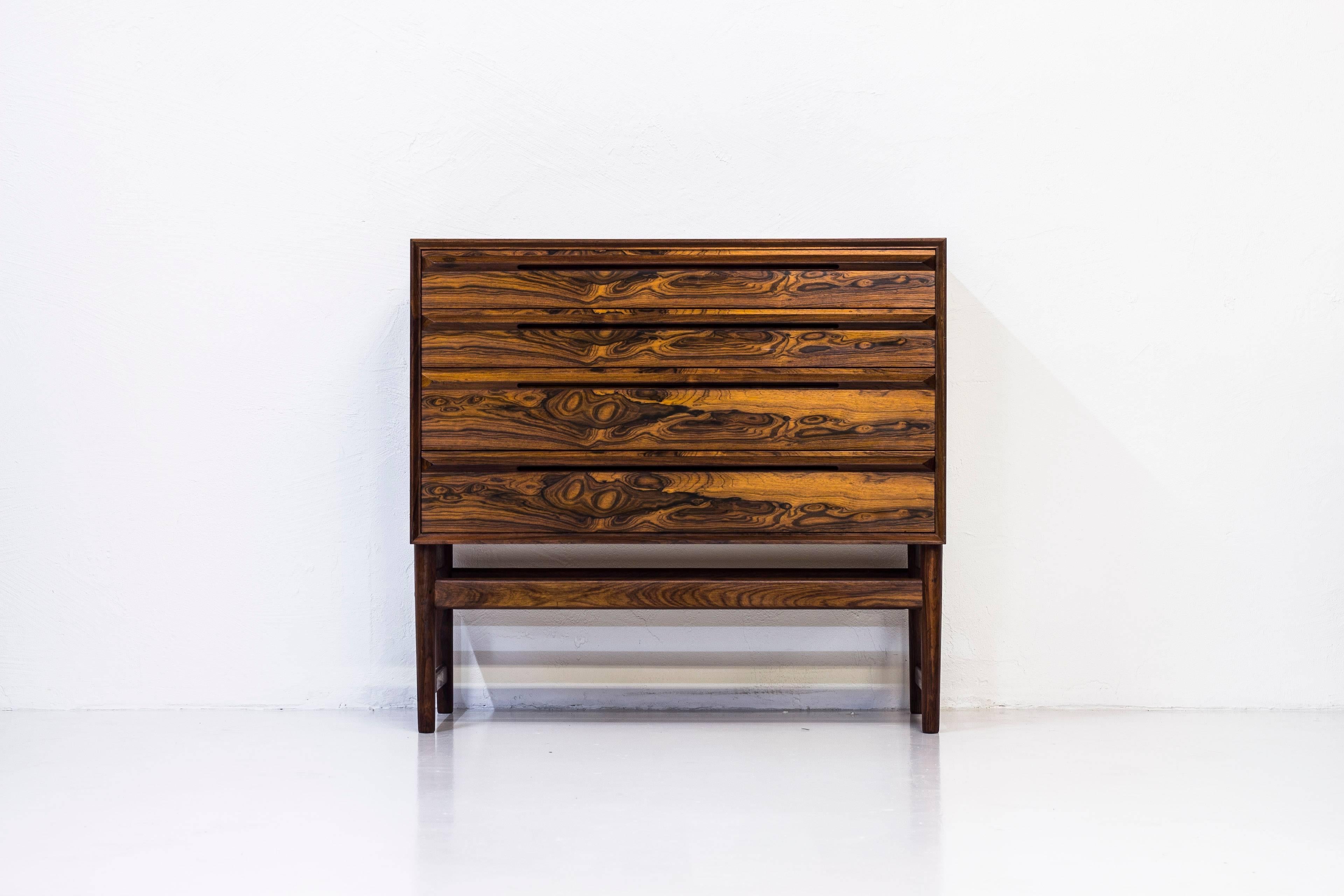 Rare chest of drawers designed by Norwegian Torbjørn Afdal. Produced in Norway by Nesjestranda Møbelfabrikk during the 1950s. Made from palisander with solid wood in the base. Inside of drawers in solid beech. Tapered nicely shaped legs. Integrated