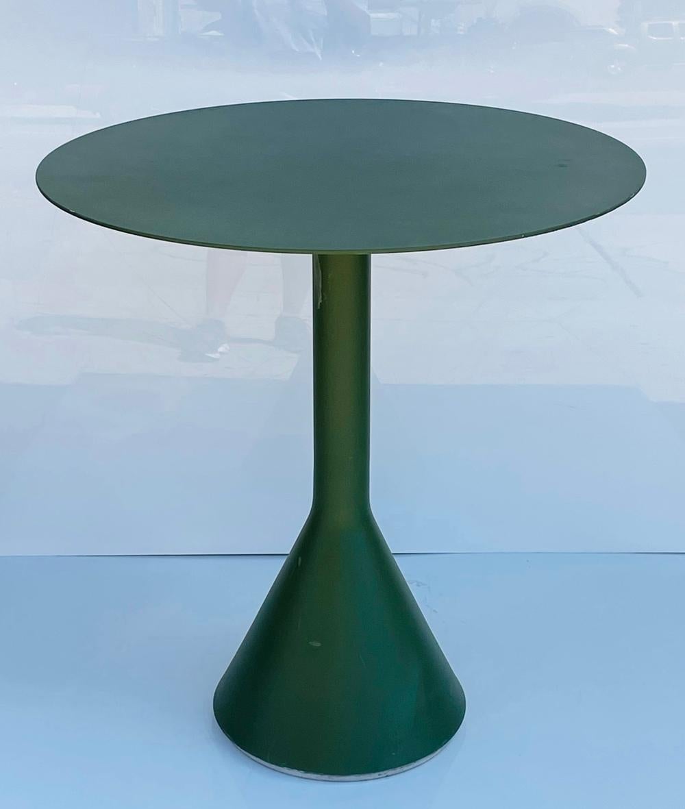The Palissade cone table is part of a collection of outdoor furniture designed by Ronan and Erwan Bouroullec. Each piece in the collection is united by a strong graphical silhouette that is sturdy without being bulky, and elegant without being