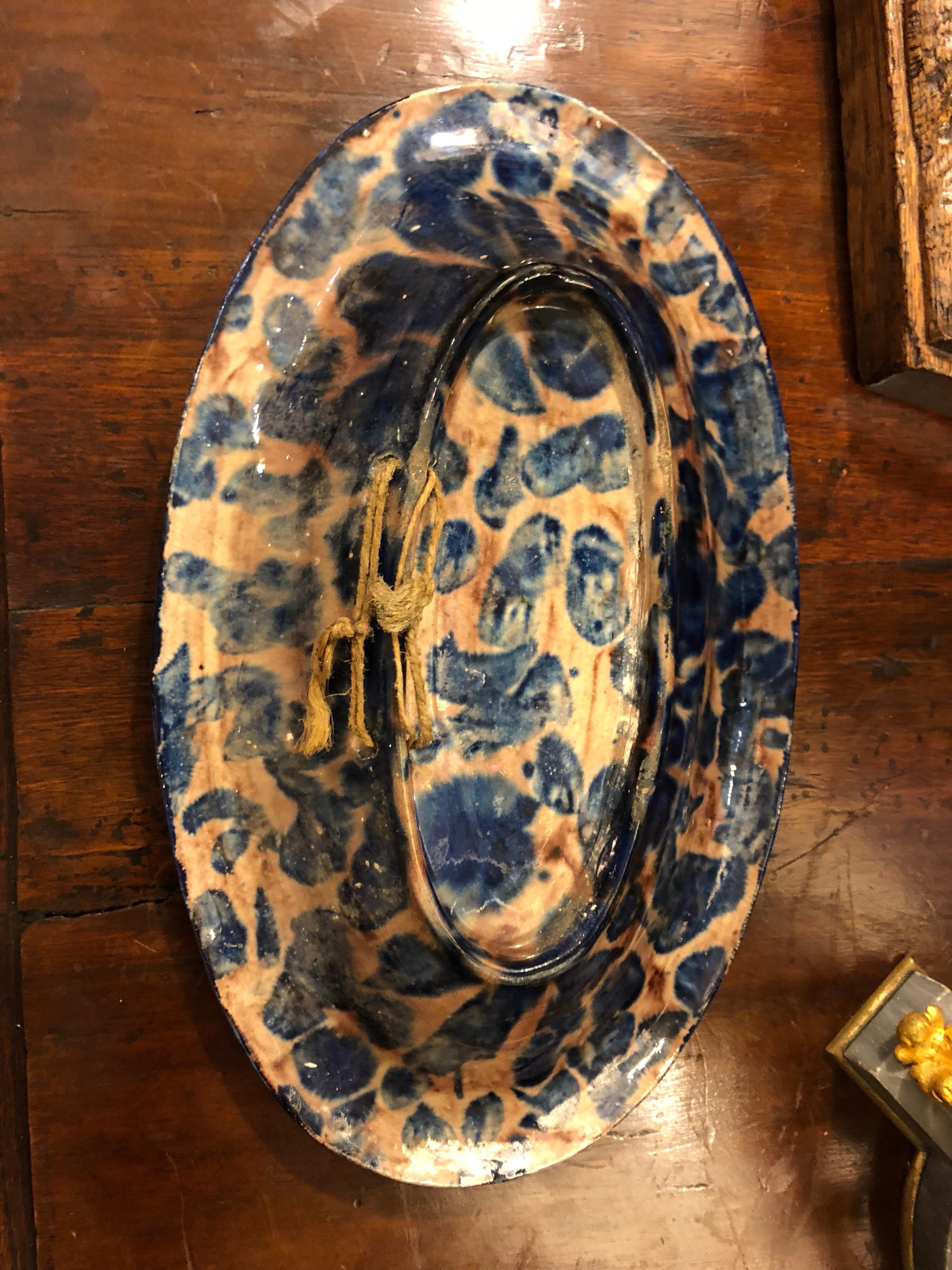 Palissy style platter with fish and snakes.