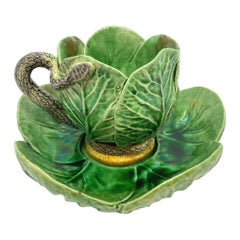 Palissy Ware Majolica Cabbage Form Cup and Saucer with Snake Handle, ca. 1880