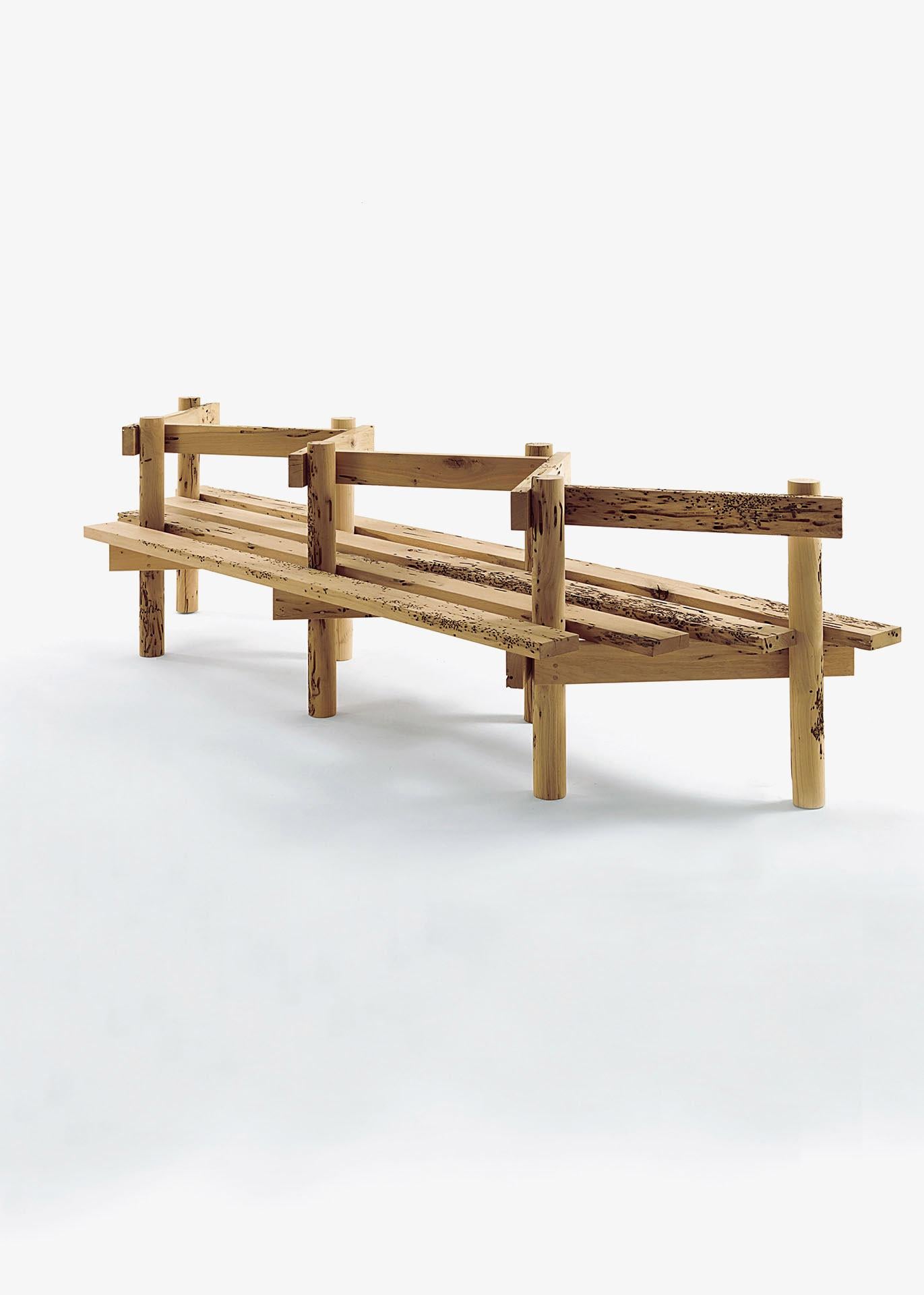 Bench completely made in solid Briccola wood. Backrest in zig zag form that defines the seats on both sides.

Designed by Michele De Lucchi and made in Italy.