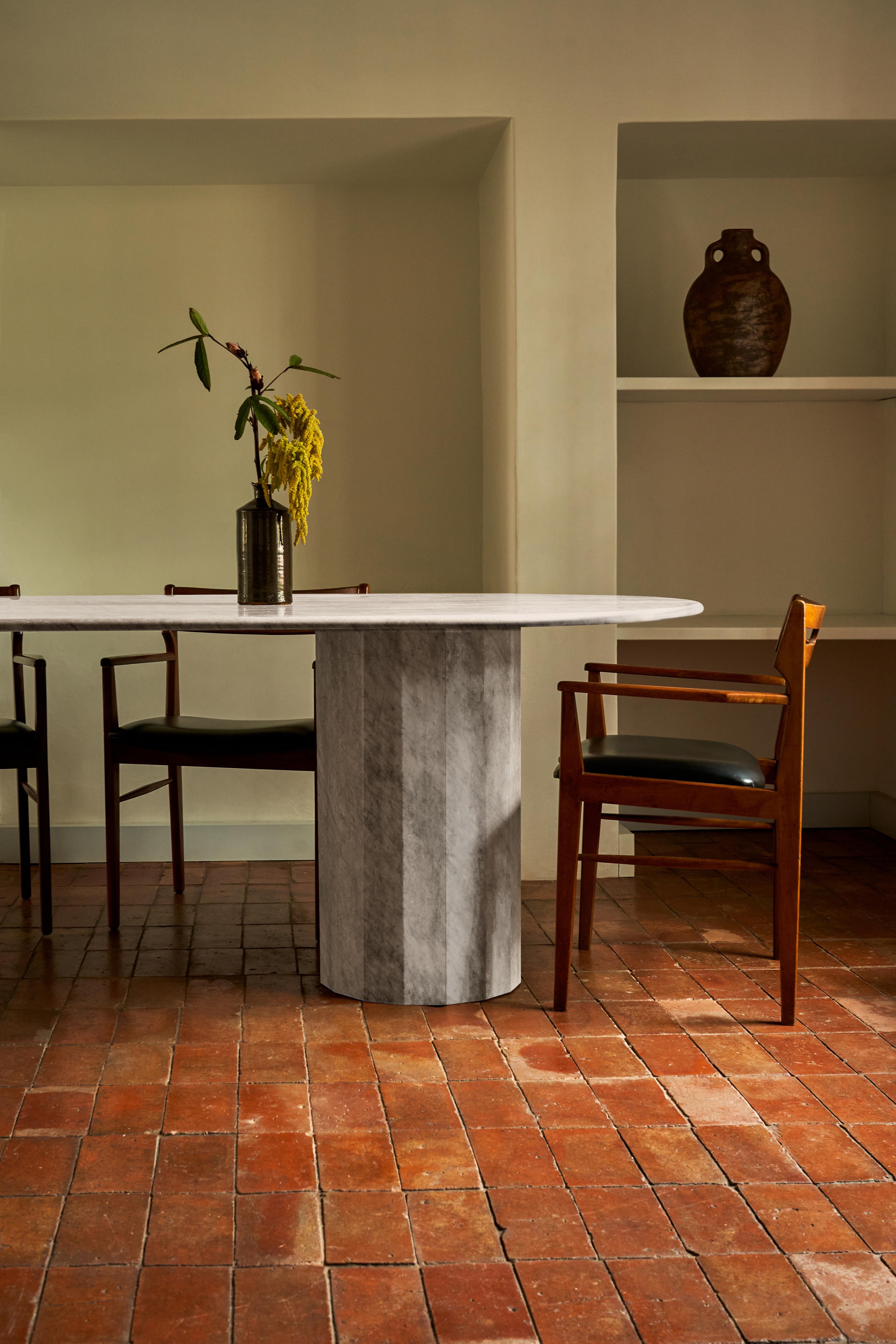The multitasking Palladian table exemplifies Kasteel's commitment to elevating simplicity. Its versatility, pure silhouette, elegant proportions, and striking texture make it suitable for a wide range of applications and settings. Crafted with a