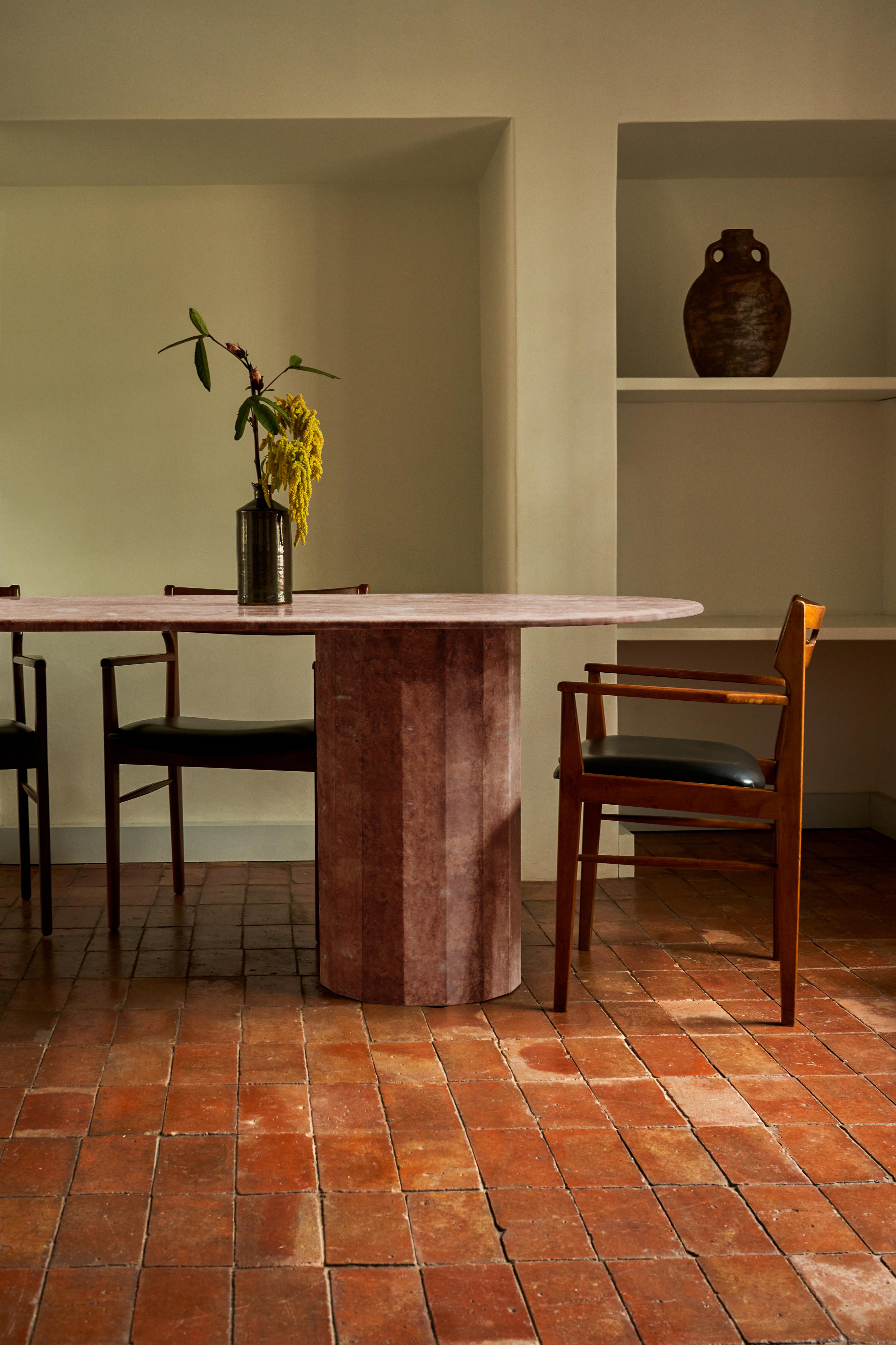The multitasking Palladian table exemplifies Kasteel's commitment to elevating simplicity. Its versatility, pure silhouette, elegant proportions, and striking texture make it suitable for a wide range of applications and settings. Crafted with a
