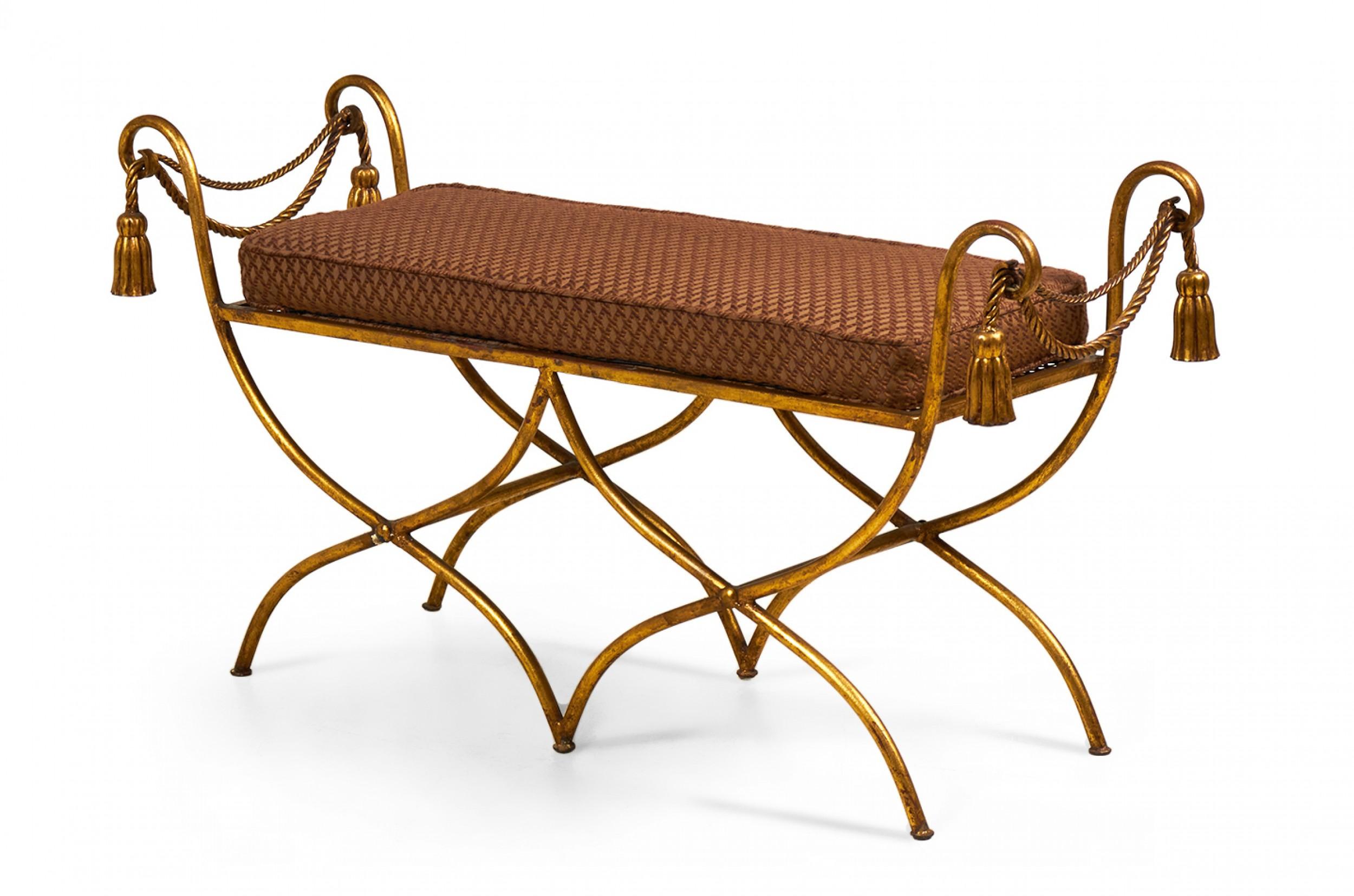Italian Baroque-style mid-century (circa 1950) Rope and Tassel window bench with a gilt iron frame and unattached burgundy and gold patterned seat cushion. (PALLADIO, ITALY)