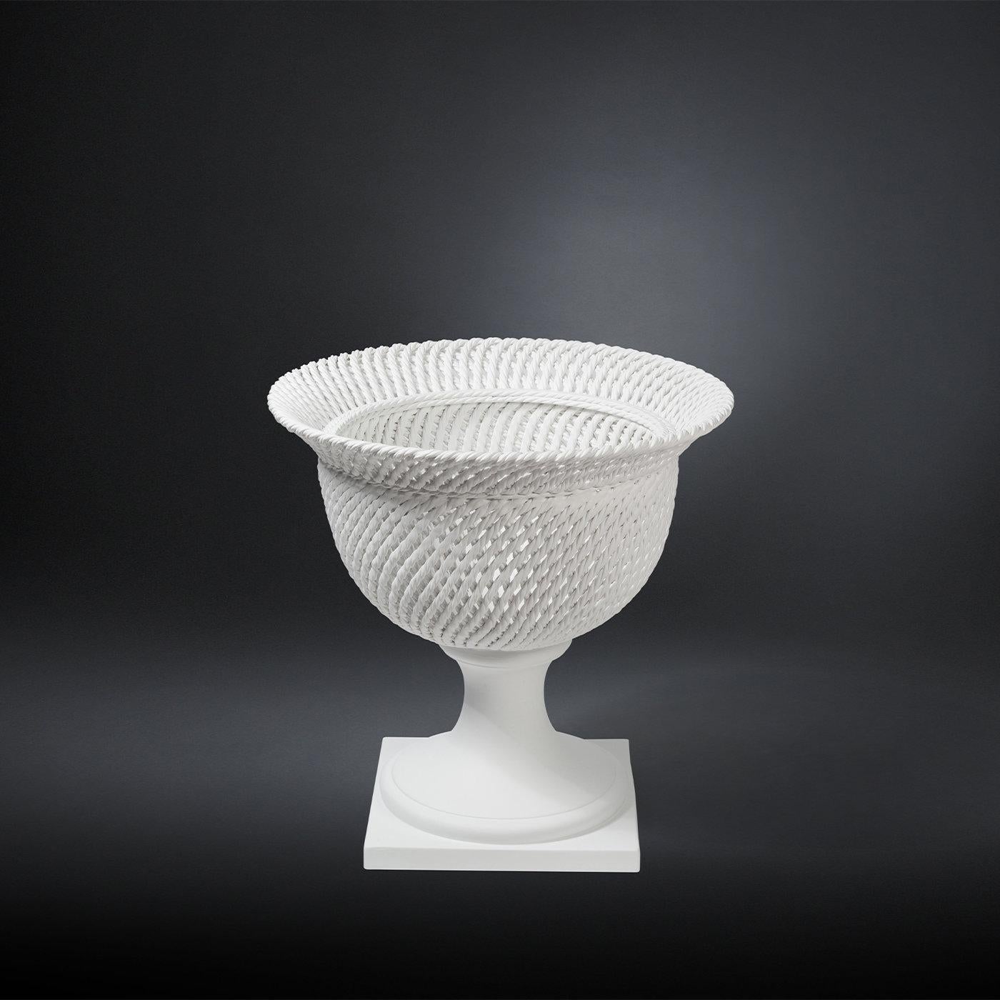 An exquisite showcase of craftsmanship, this stunning decorative vase is named after Italian Renaissance architect Andrea Palladio. Boasting an elegant shape reminiscent of a classic chalice with a wide cup, this piece is entirely fashioned of white