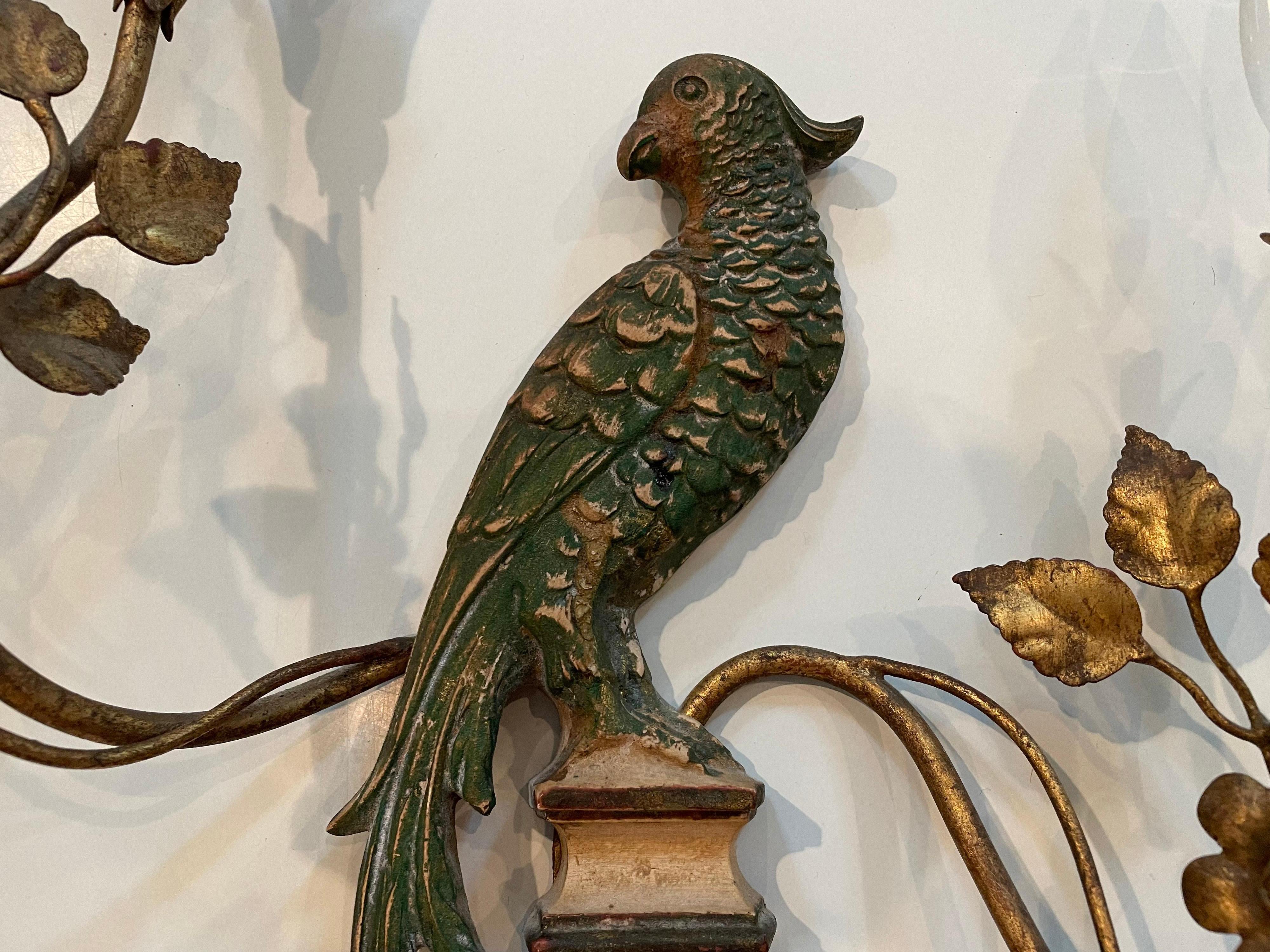 This is a pair of wonderful Painted wood bird and gilt metal sconces by the maker Palladio 
They were probably from the 1950s-60s In great condition and are electrified.