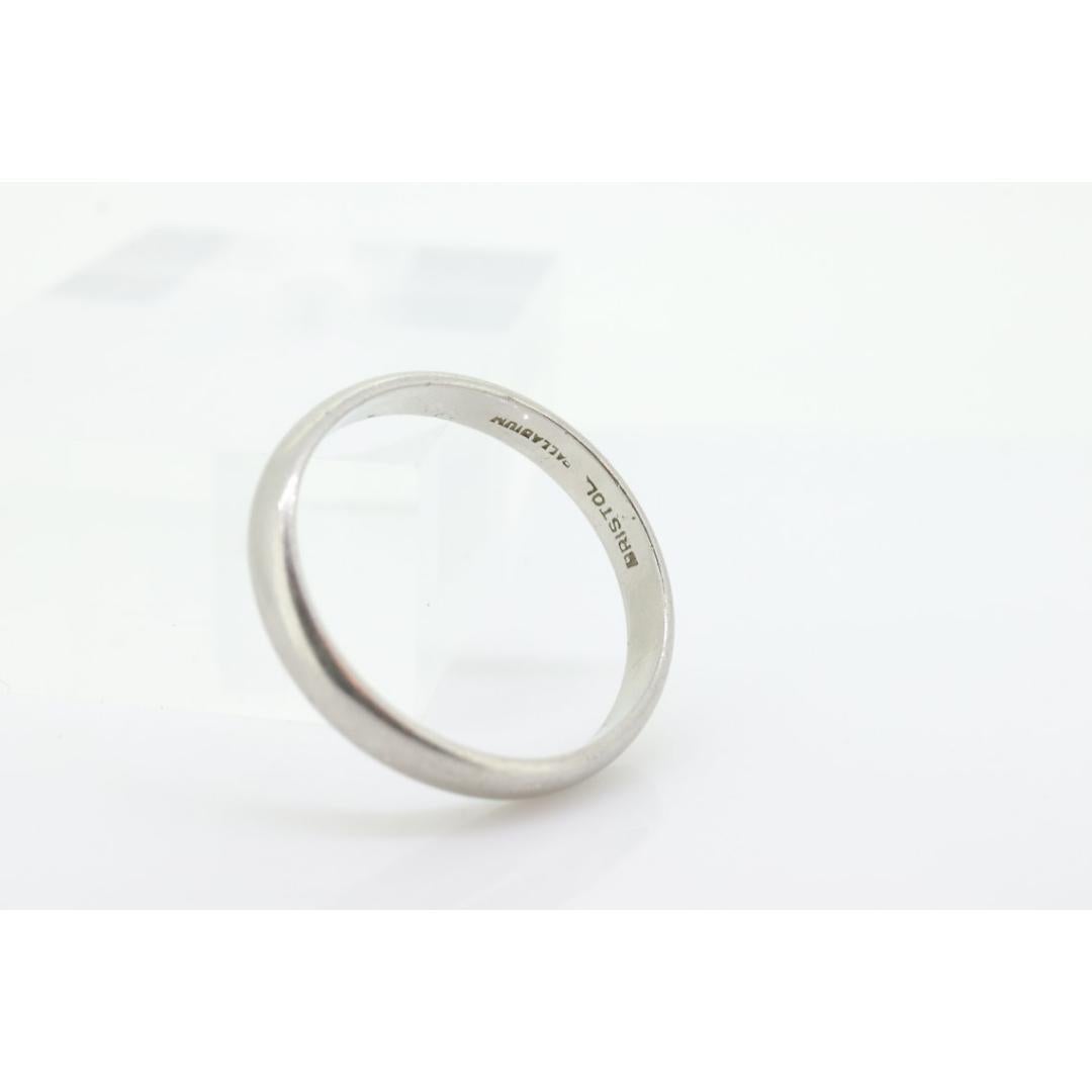 Vintage from before 2000
Size: 10
Materials: Palladium
Band Color: White

Style: Minimalist

Heavy Palladium Band. Unisex. Size 10.75.

Made by Bristol

Condition: Has scratches. vintage. May be polished at request for no extra