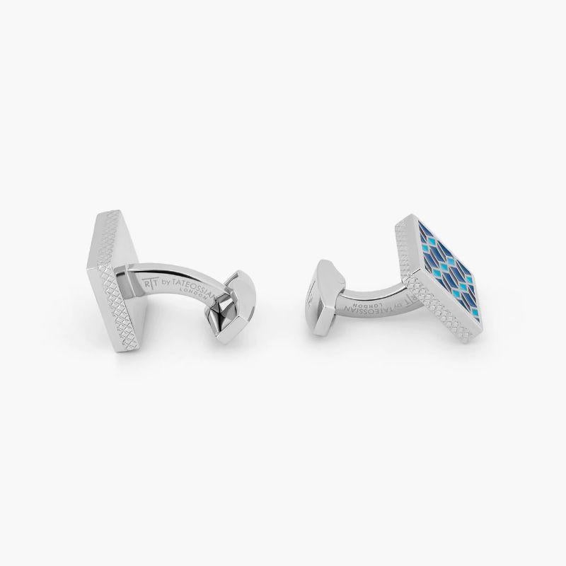 Palladium plated Geometric cufflinks with blue enamel

These edgy cufflinks are the latest addition to our enamel cufflinks collection. They feature a geometric diamond pattern that creates the illusion of 3D cubes. They have been carefully