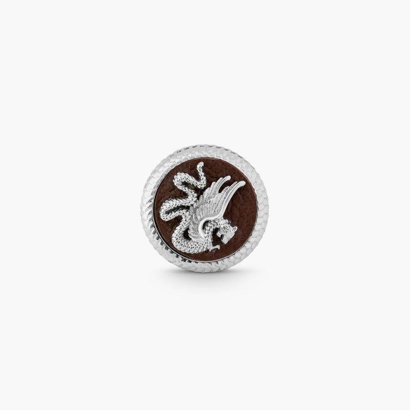 Palladium plated Wyvern pin with brown leather

Inspired by legendary mystical animals, these stylish cufflinks feature hand-carved wyverns and dragons. In traditional folklore,the 