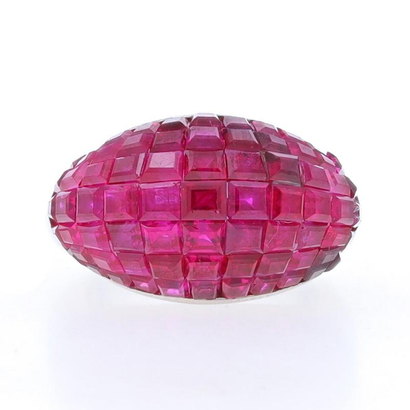 Size: 5 1/2

Metal Content: Palladium & 18k Yellow Gold (undercarriage)

Stone Information
Natural Rubies
Treatment: Heating
Carat(s): 8.50ctw
Cut: Rectangular
Color: Pinkish Red

Total Carats: 8.50ctw

Style: Cluster Cocktail Dome Band
Features:
