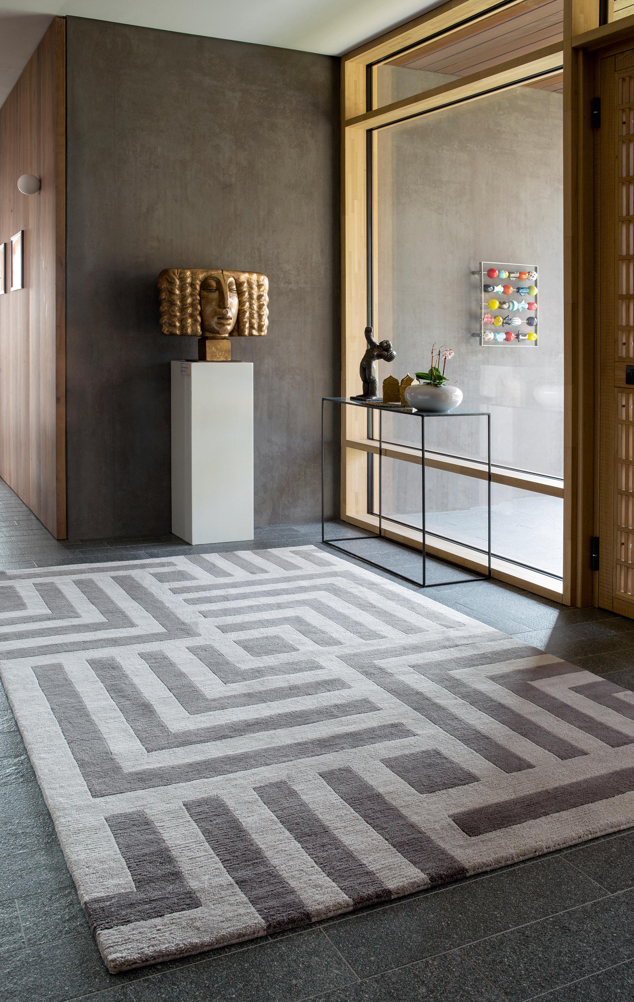 Features a series of interlocking grids in a sophisticated neutral palette, Pallas is a statement design which can be used in both contemporary and traditional interiors. This rug is entirely handcrafted from the finest Tibetan wool by our master