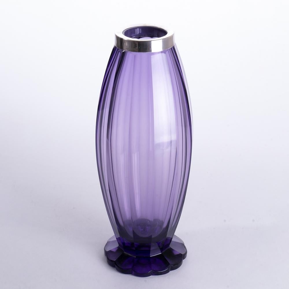 A Pallme-Konig Czech Art Deco vase in amethyst glass with silver collar (.800). Acid stamped marks to the base. Excellent condition.