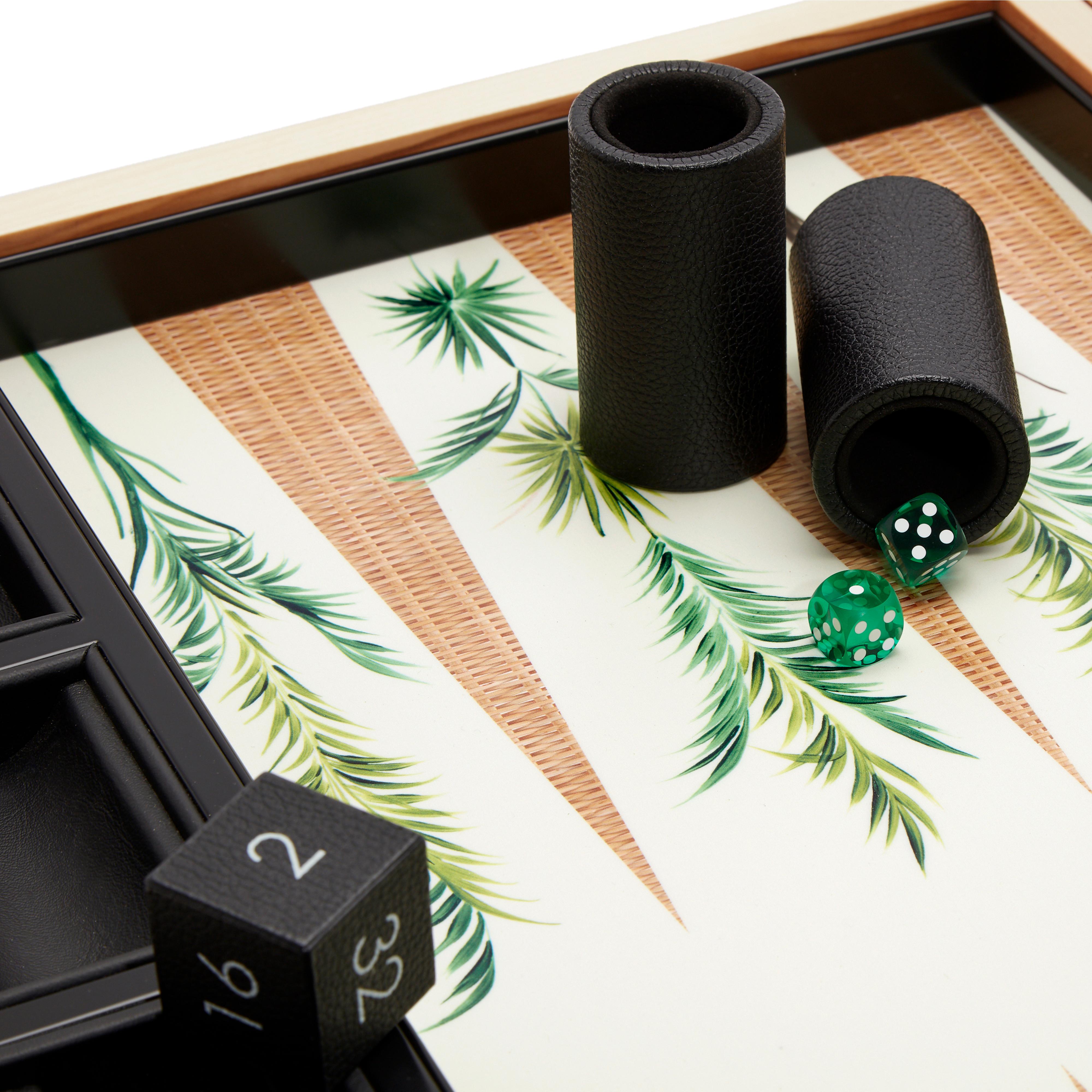 This design conjures up every player’s dream of sitting in the shade of palm fronds with a day of backgammon ahead. Palm is part of Alexandra Llewellyn’s signature collection of hand-painted and hand crafted backgammons. The London based artist has