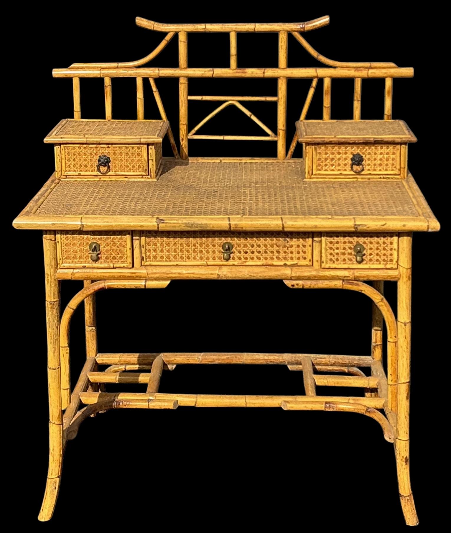 20th Century Palm Beach Chic Bamboo & Cane Chinoiserie Pagoda Form Desk