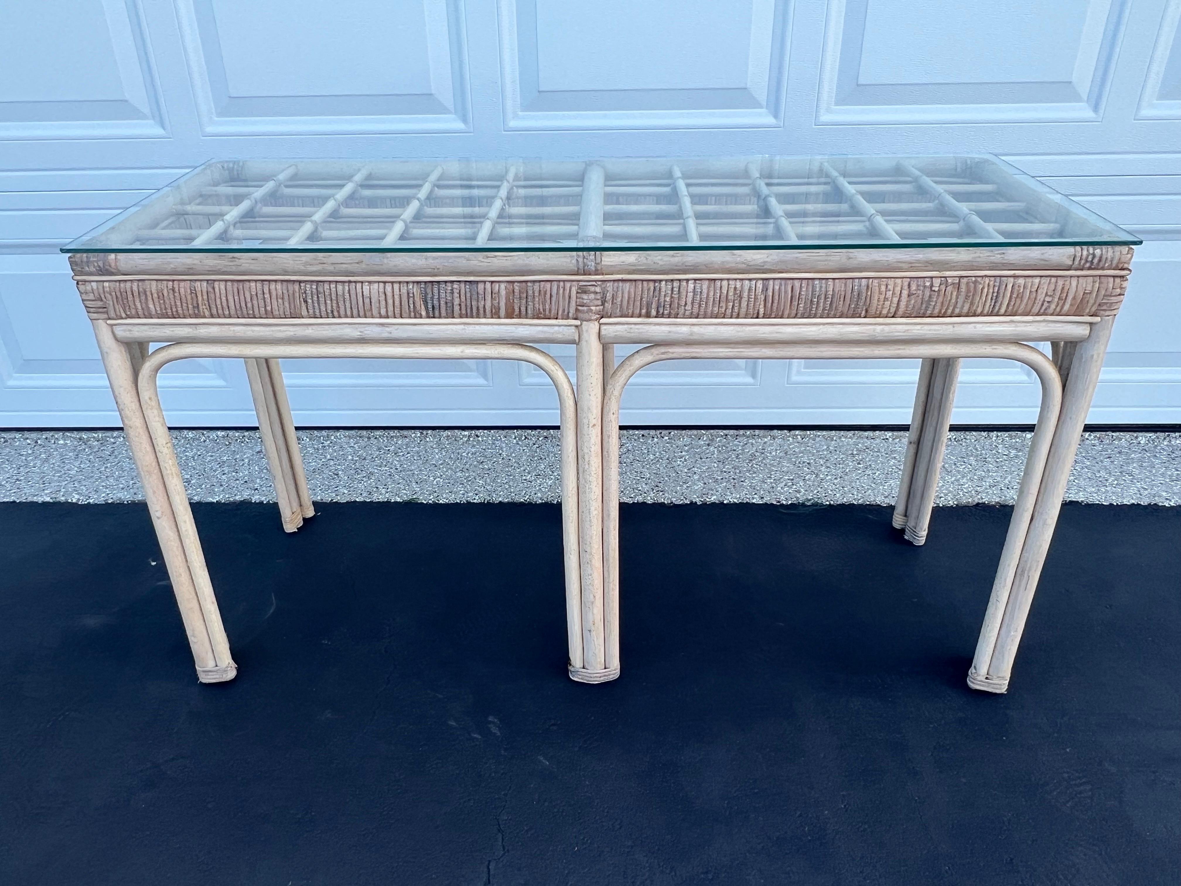 Palm Beach Rattan and Wicker Sofa Table. Clean lines with glass top. Perfect behind a sofa or even in an entryway. 