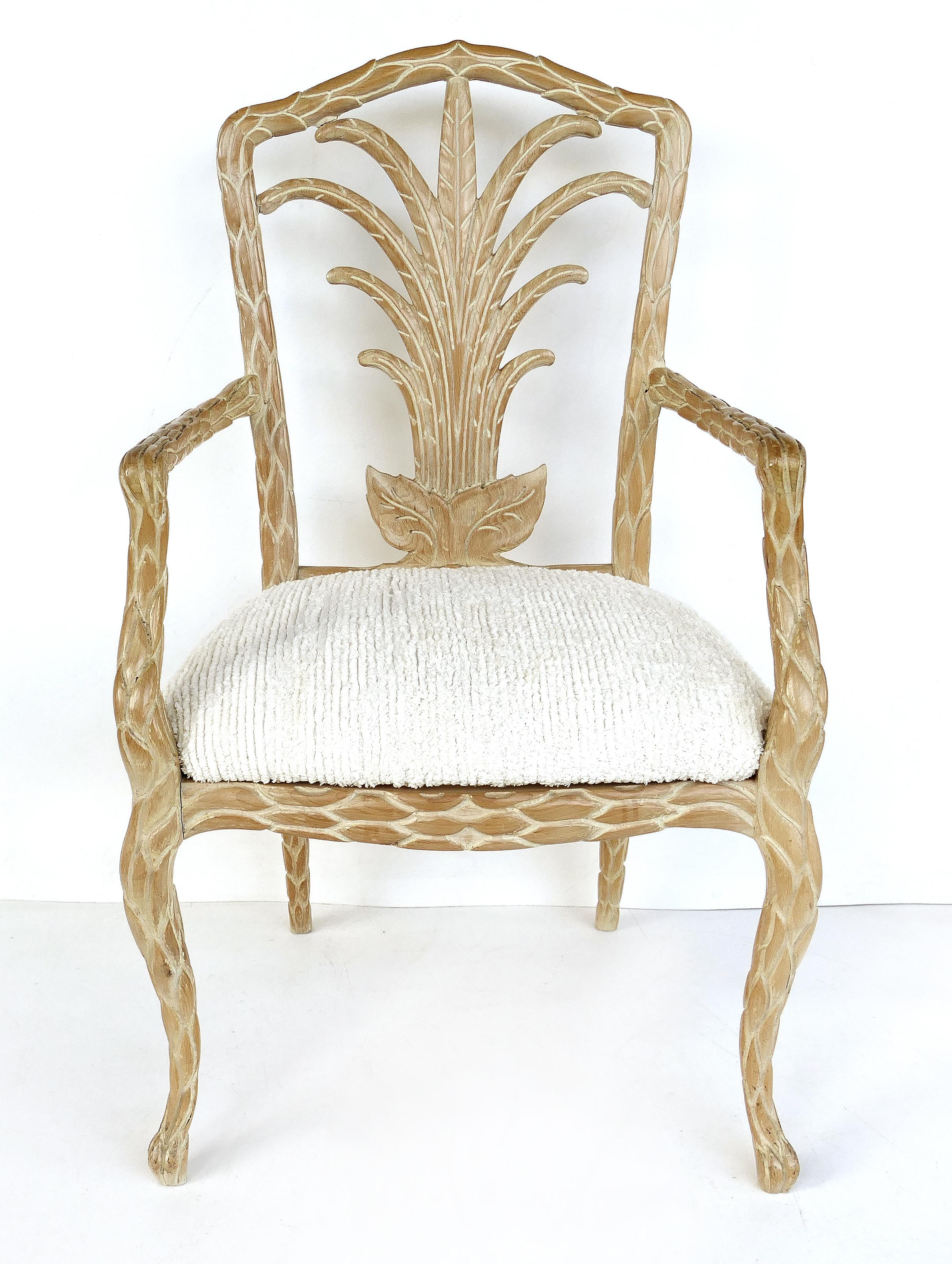 Palm Beach Regency faux bois Kreiss armchairs, a pair

Offered for sale is an elegant pair of Palm Beach Regency Faux bois carved wood armchairs with palm frond details by Kreiss. These stately chairs are beautifully carved and the wood has a lovely