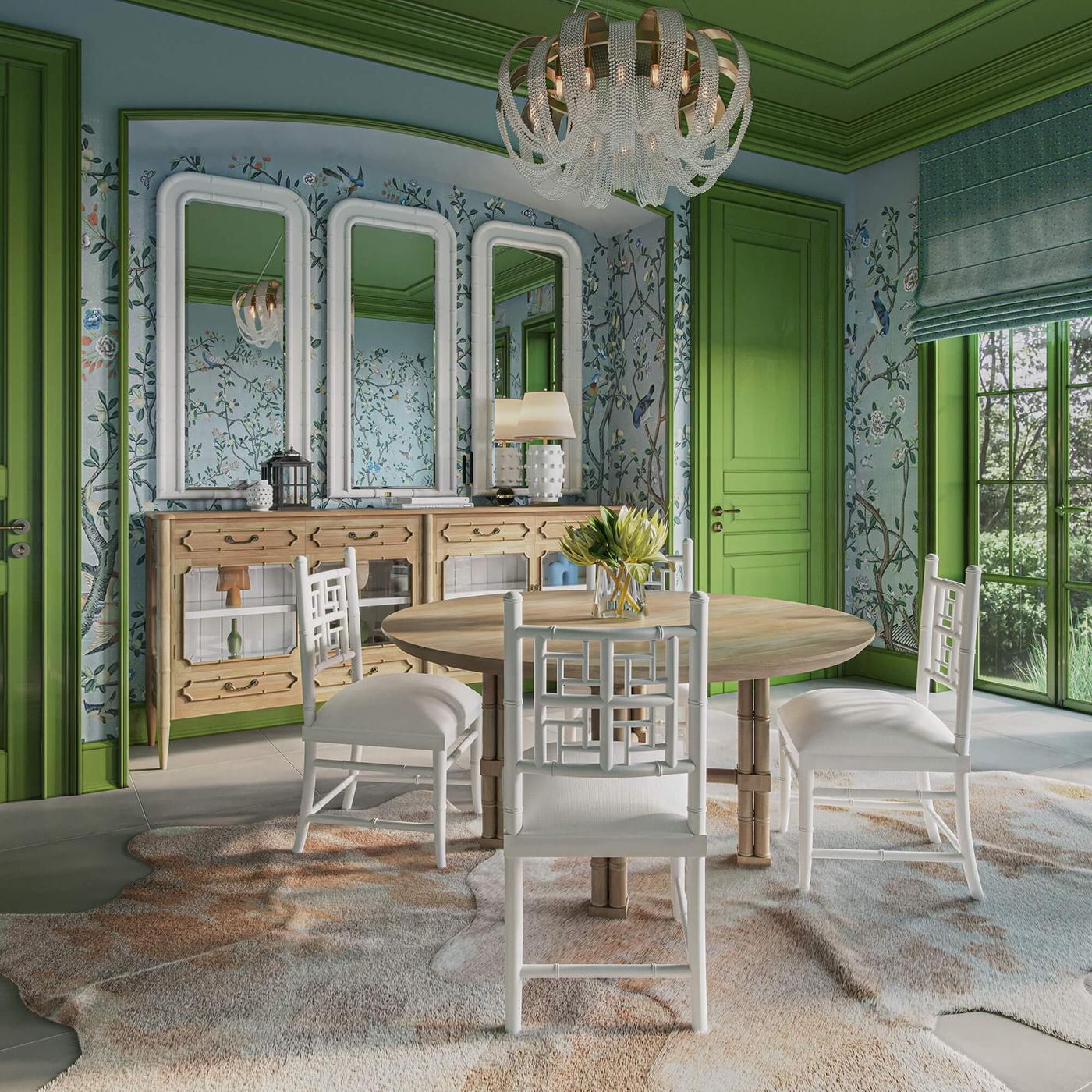 Hand-carved from mahogany in a light fruitwood finish, this statement table features faux bamboo legs in the form of classic English cluster columns, joined by an X-form stretcher that adds both stability and architectural flair.

The round top