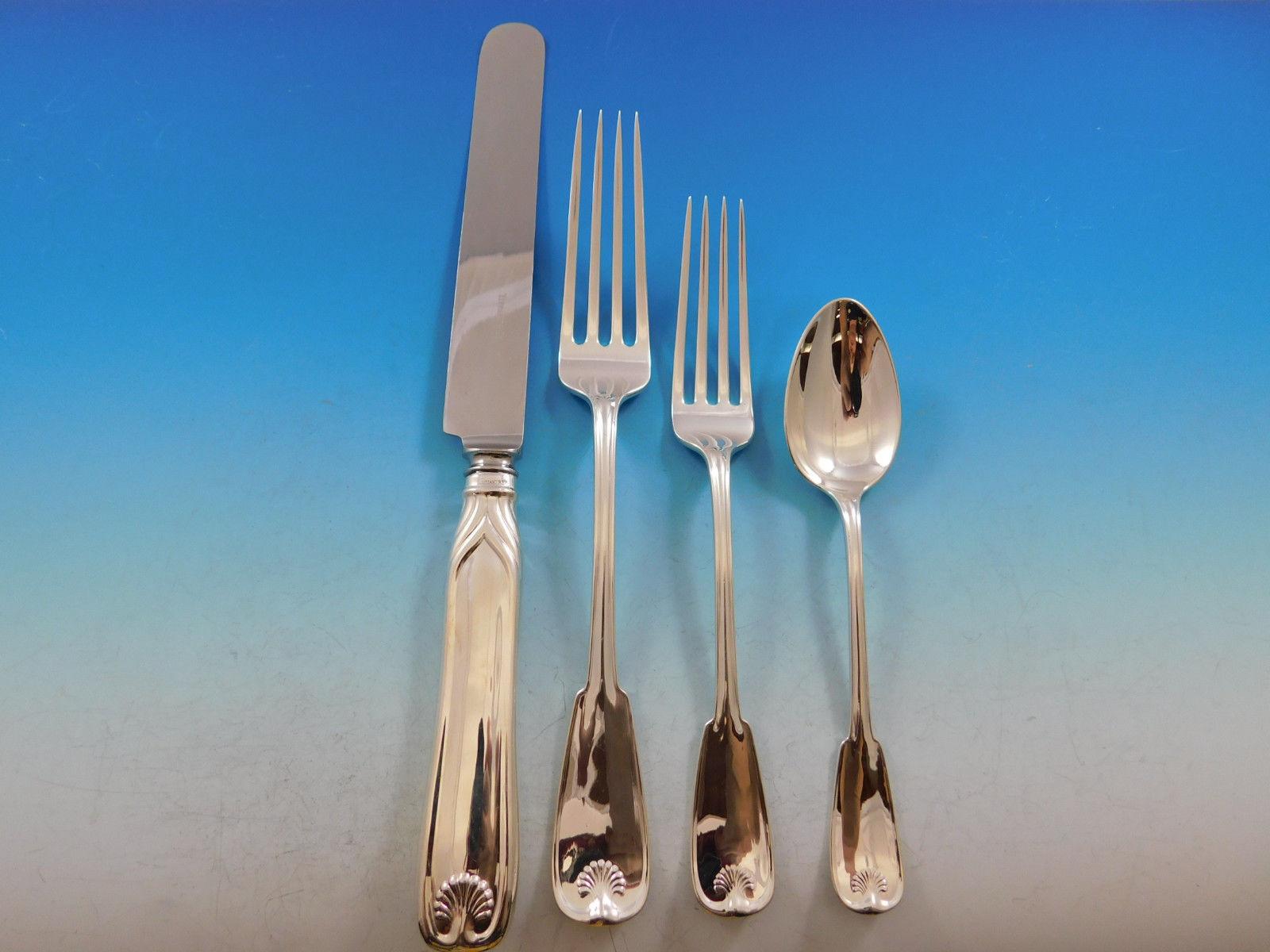 Superb rare dinner and luncheon Palm by Tiffany & Co. sterling silver flatware set of 75 pieces. This pattern was patented in the year 1871 and features a fiddle shaped handle, a stylized palm, and a thread border. This set includes: 

12 dinner