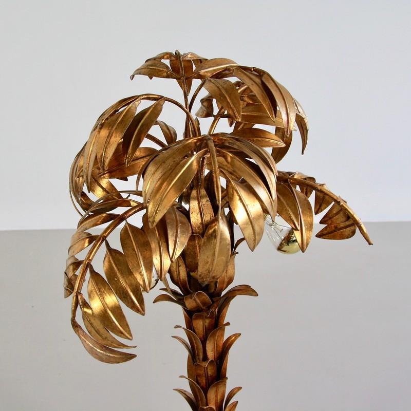 Palm lamp designed by Hans Kögel, Germany, 1970s.

Produced by hand in small numbers, gilded metal construction with several light sockets. Beautifully produced lamp, giving a wonderfully warm light.

Condition: 
Very good vintage condition,