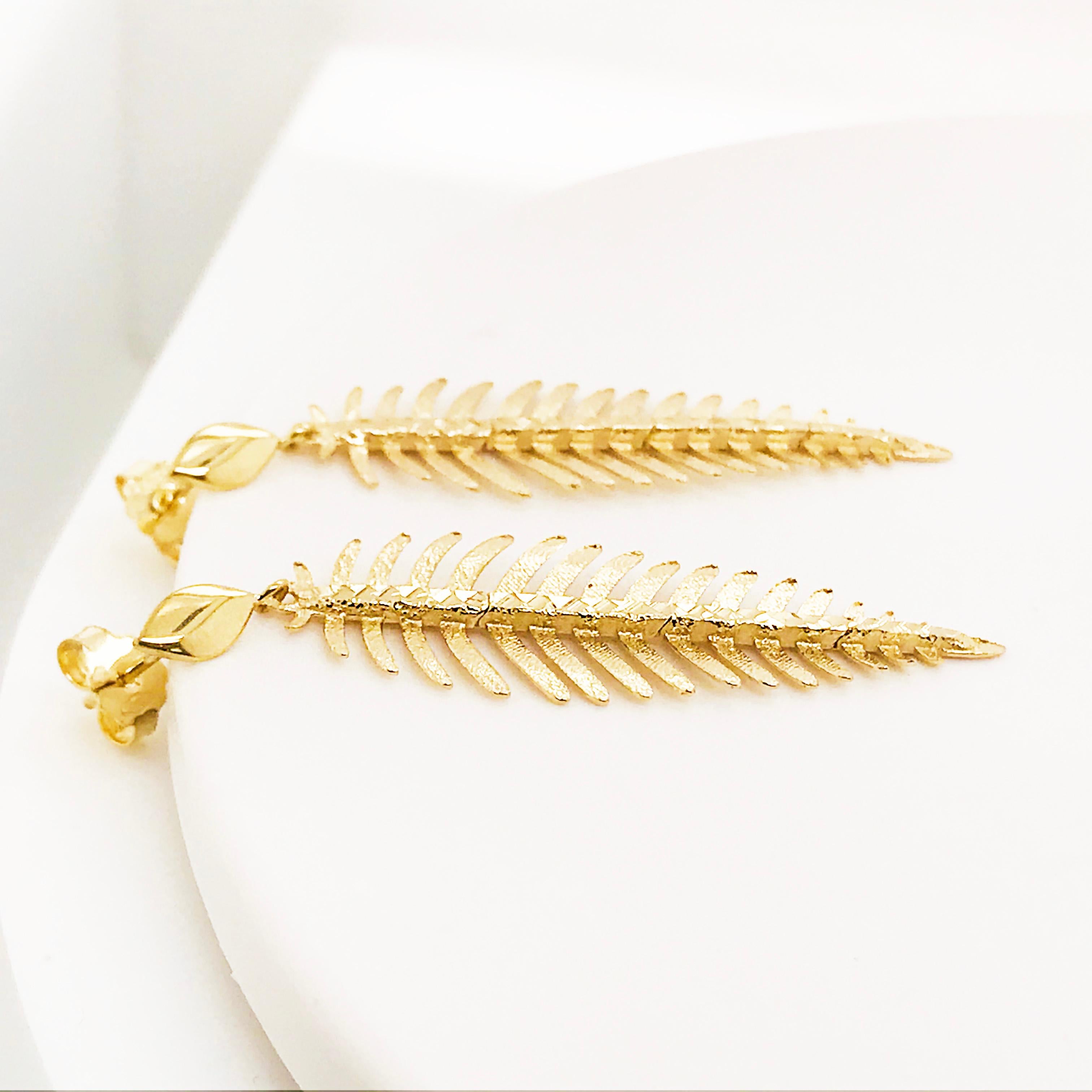 These clever earrings are solid 14 karat yellow gold and move when you move!  Perfect when you want your earrings to show!  They have a beautiful sparkle when the light hits them!  The details are as follows:
Metal Quality: 14K Yellow Gold
Earring