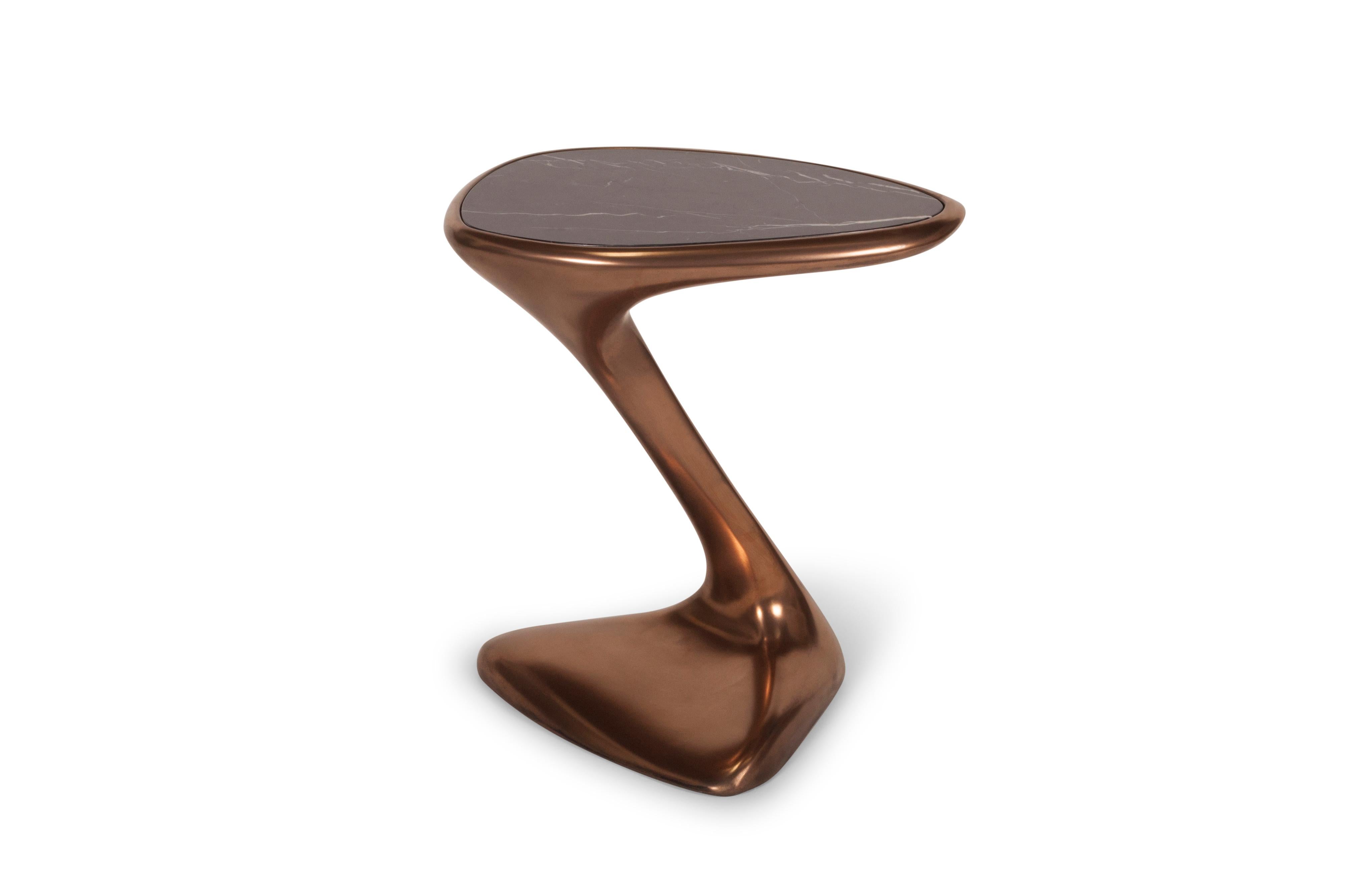 The palm side table is made out of wood with bronze finish with black marble top.

About Amorph: 
Amorph is a design and manufacturing company based in Los Angeles, California. We take pride in hand crafted designs connected to technology to create