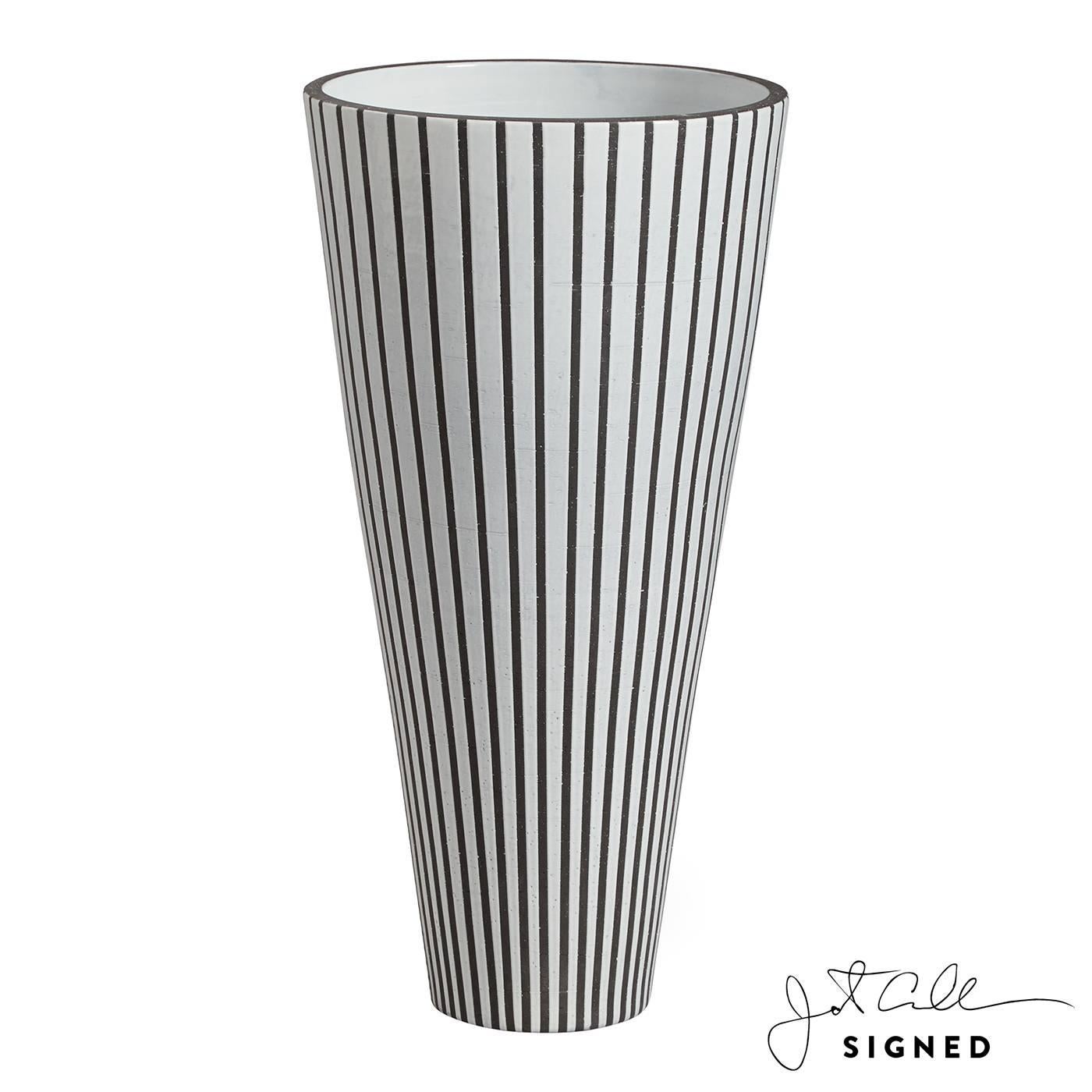 Couture craft. Joining our Palm Springs collection: very limited-editions, hand-thrown by skilled artisans in our Peruvian workshop. Our palm springs giant water tower vase is part of an exclusive series:

12 limited-edition designs
Only eight of