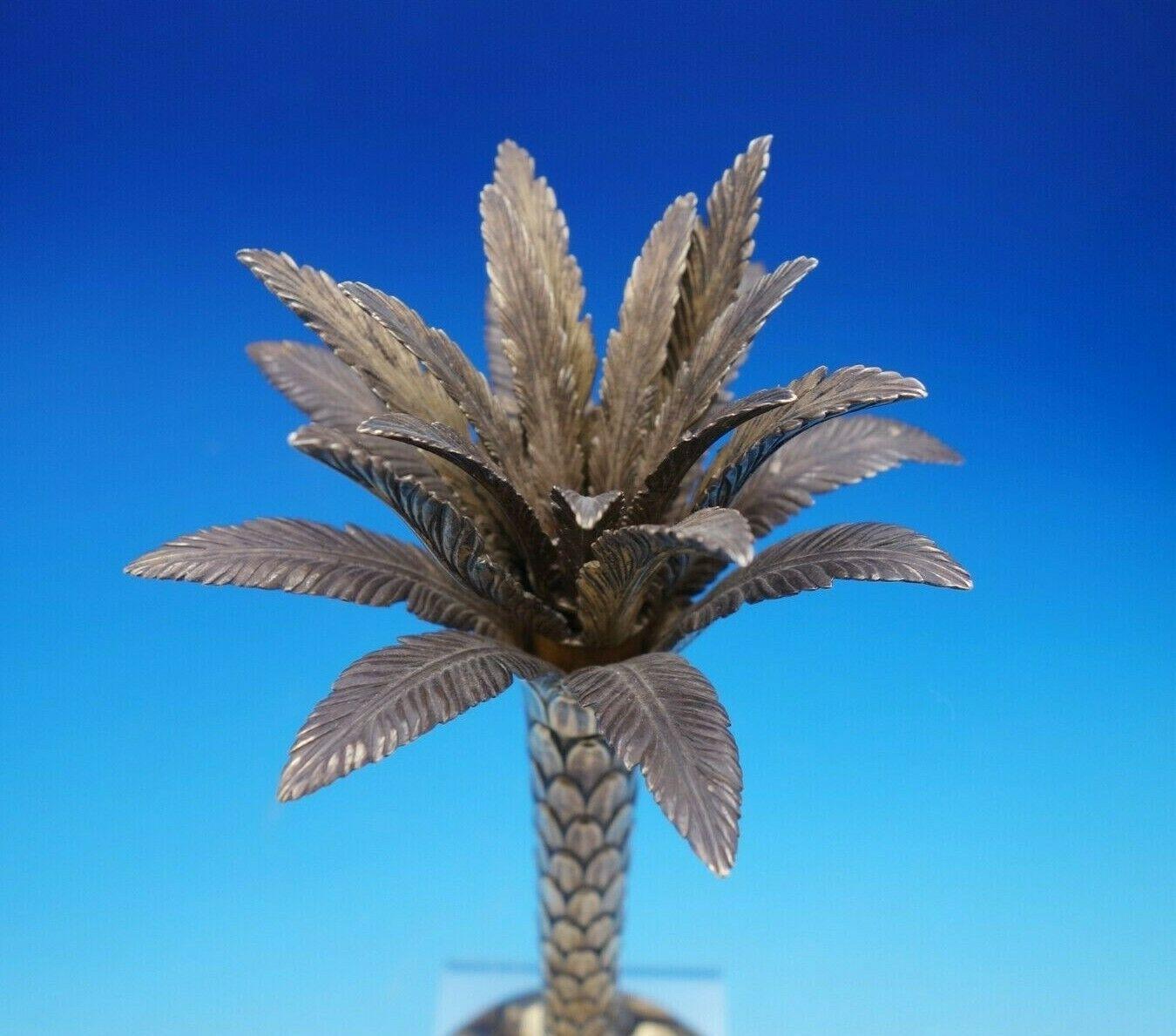 Palm Tree by Tiffany & Co.

Exceptional three-dimensional Palm Tree by Tiffany & Co sterling silver vermeil (gilded) candlestick by DeVecchi Gabriele. This figural candlestick measures 5