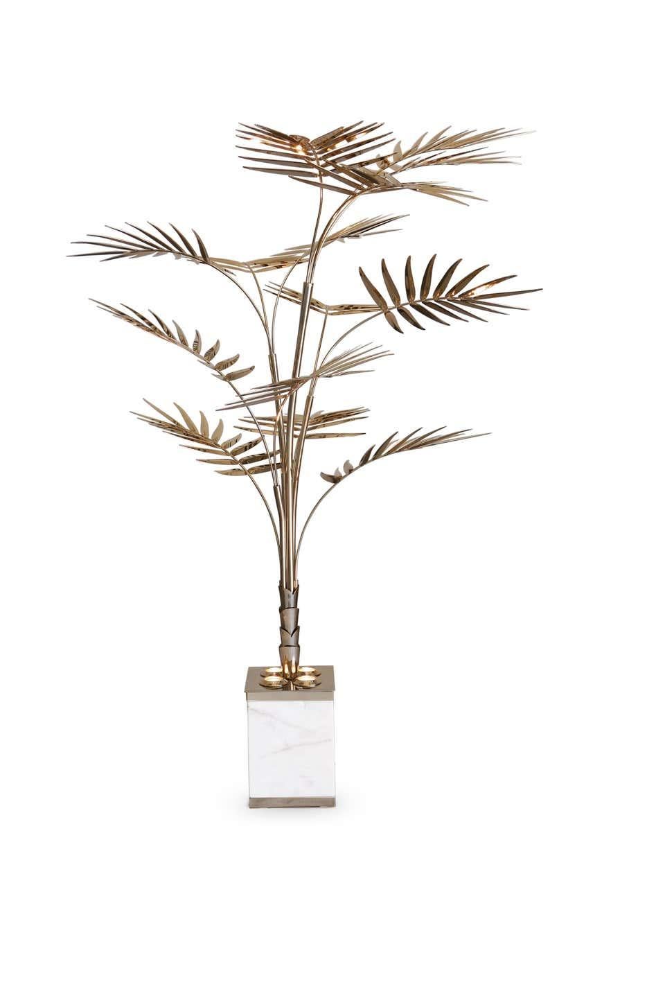 Palm tree floor lamp in brass with marble base

Estimated production time: 8-9 weeks

Materials: gold plated brass and estremoz marble

Dimensions:
Height 64.57 in. (164 cm)
Diameter 42.92 in. (109 cm)

Metal finishes available:
Polished