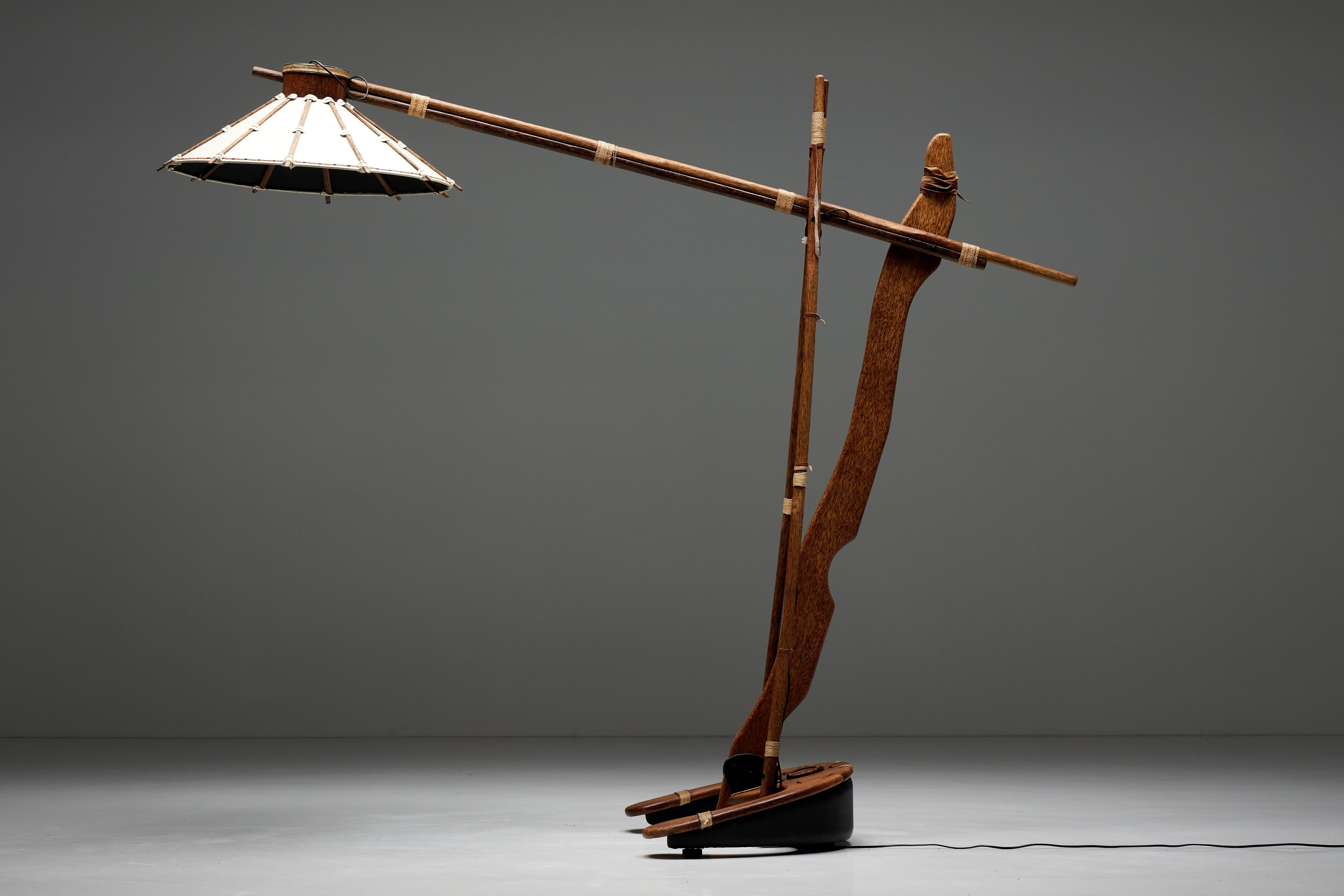 Palm Wood; Studio Craft; Arc; Floor Lamp; 1980s; American Craftsman; Craftsmanship; Ethnic Inspired; Lightning; Artist; Functional Art; 

Palm wood floor lamp, a testament to craftsmanship and luxurious materials. Expertly handcrafted using high-end
