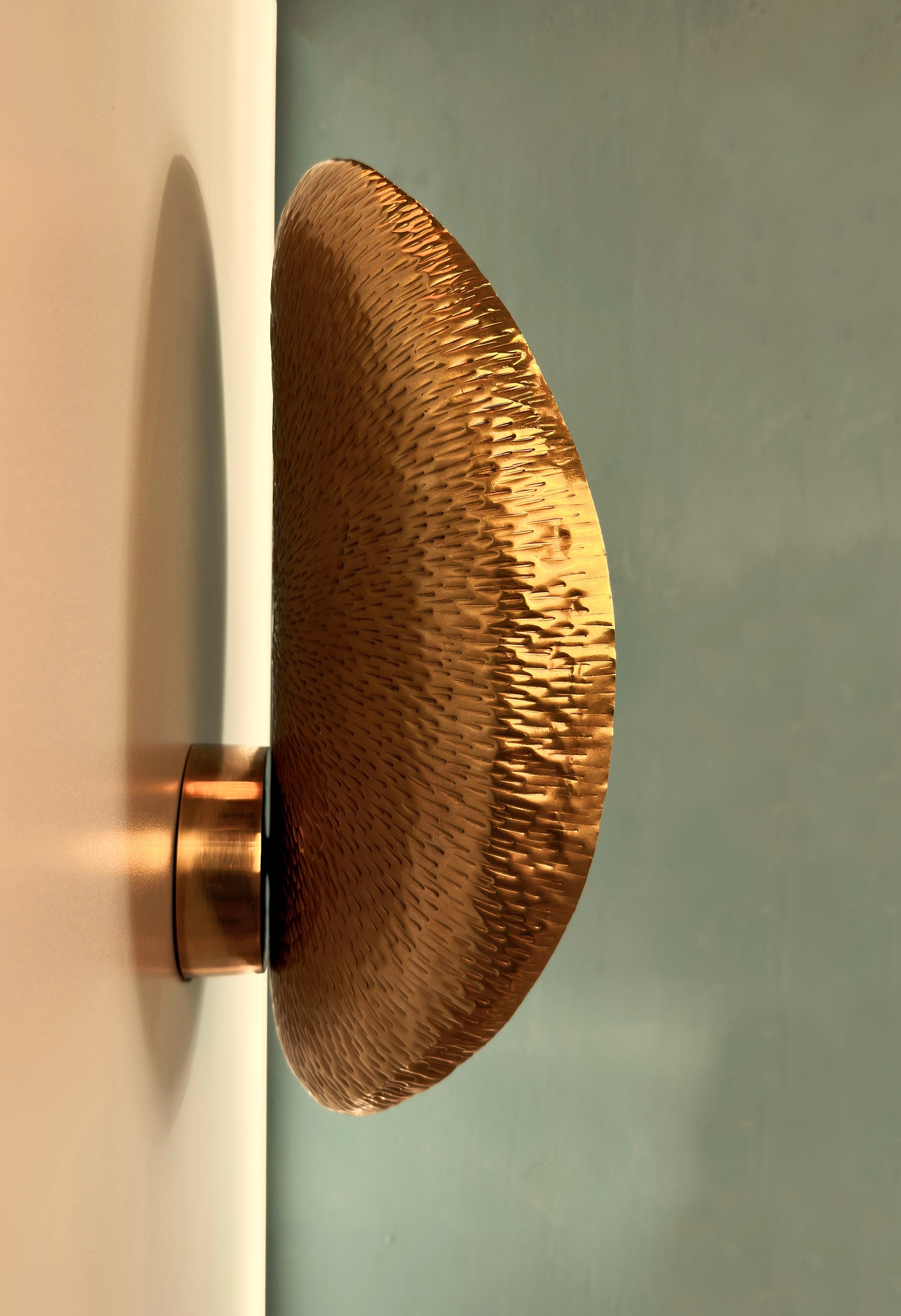 Contemporary Palma Hammered Brass Wall Sconce For Sale