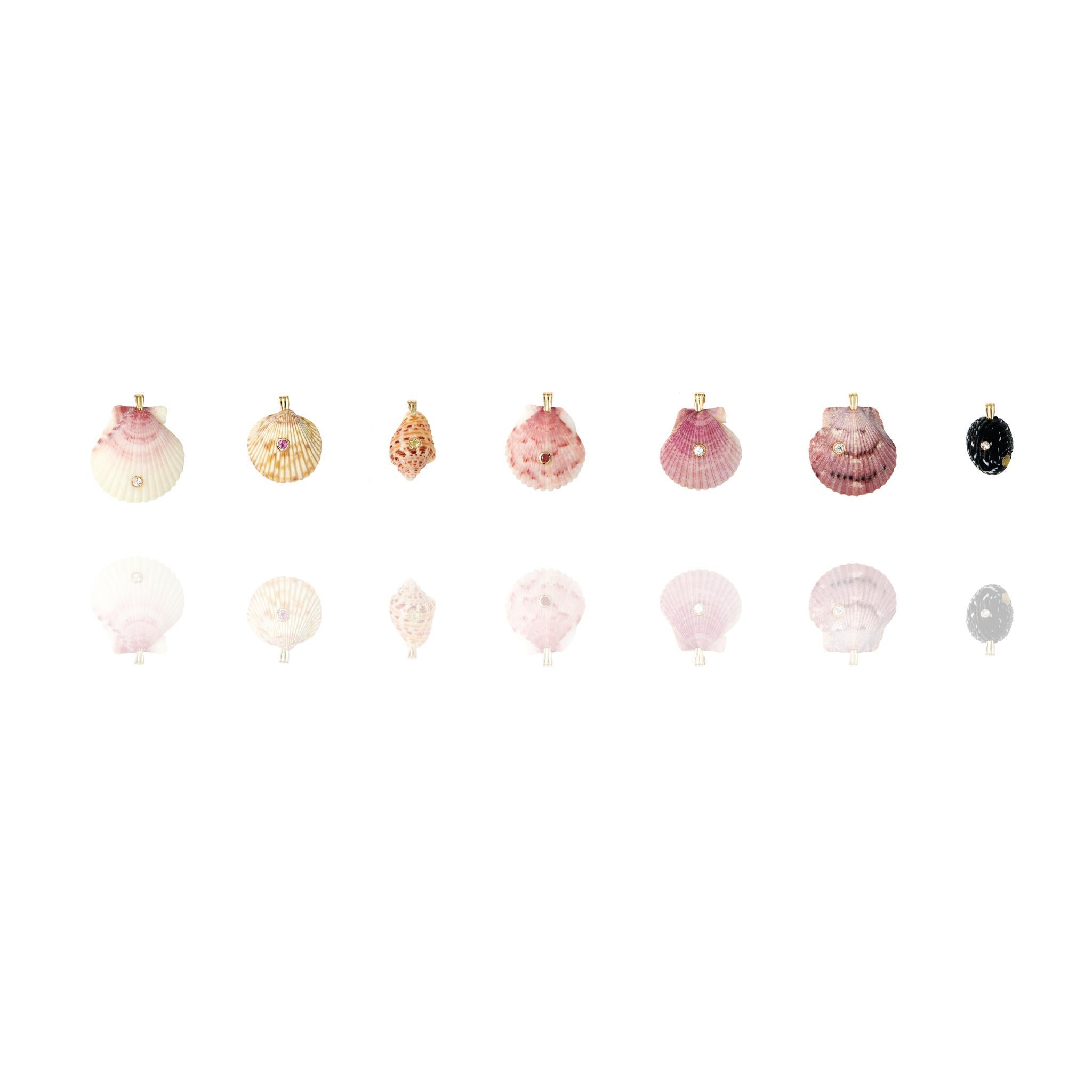 Natural shell pendant with solid 14k gold findings and natural peridot gemstone. Wear this pendant alone or layer it with other gold chains for a beautiful layered effect.  

Order includes one shell pendant, exactly as depicted in primary image.