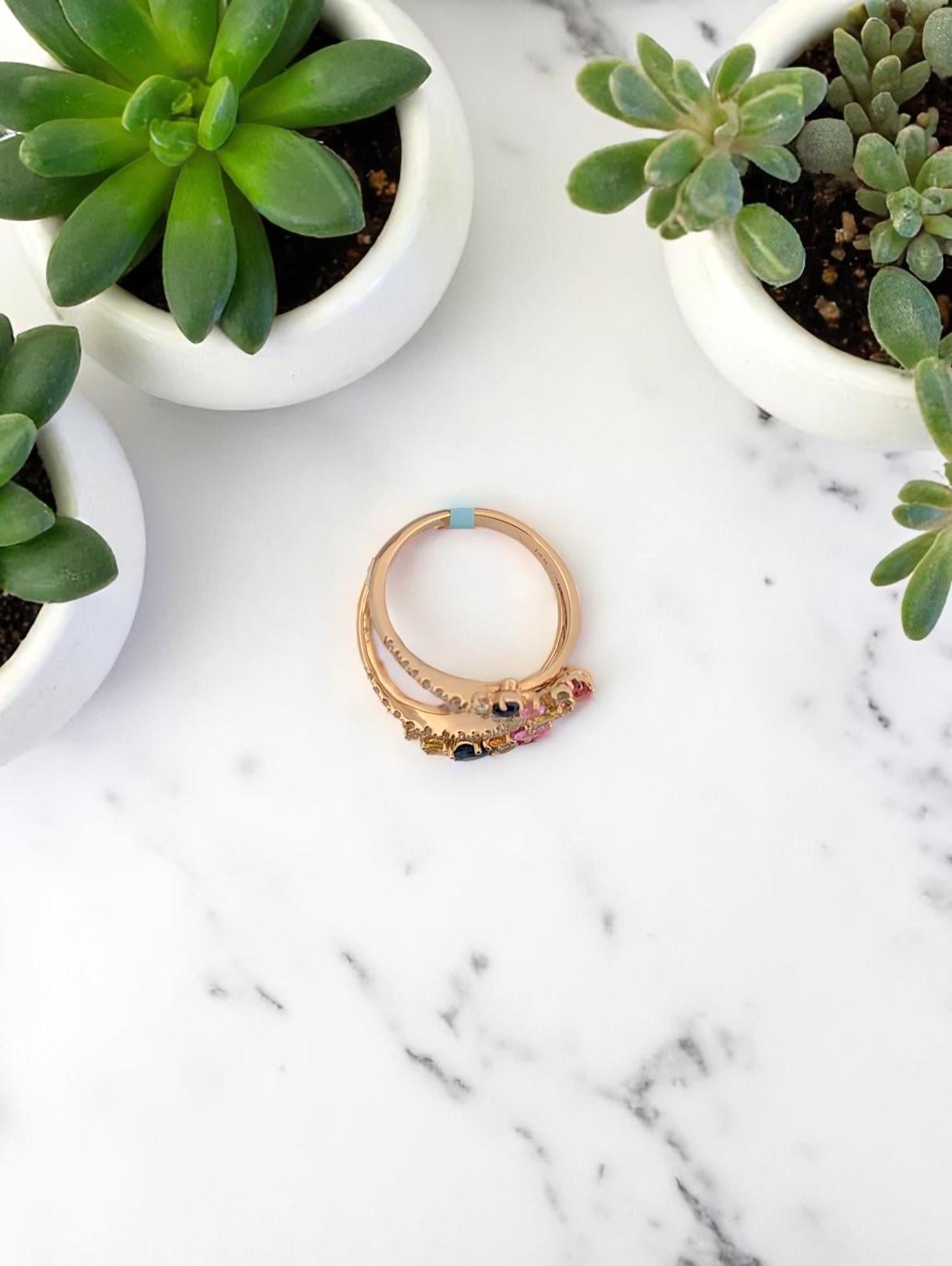 Vibrant, joyful, and luxuriously crafted — the Palmer Ring by Mountain Song Jeweler is a celebration of color and brilliance. Set in warm, radiant 14k yellow gold, this ring features 2.20 carats of richly colored natural sapphires, elegantly framed