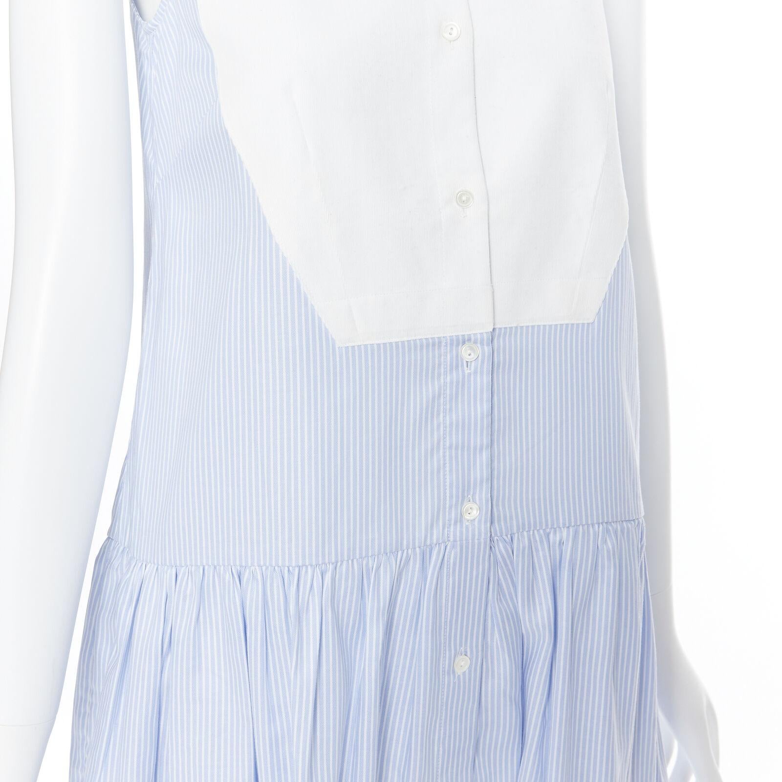 PALMER HARDING 100% cotton white bib front blue striped summer dress UK8 XS
Reference: SNKO/A00125
Brand: Palmer Harding
Material: Cotton
Color: Blue
Pattern: Striped
Closure: Button
Extra Details: Button front closure. Dart pleat at waist. Dropped
