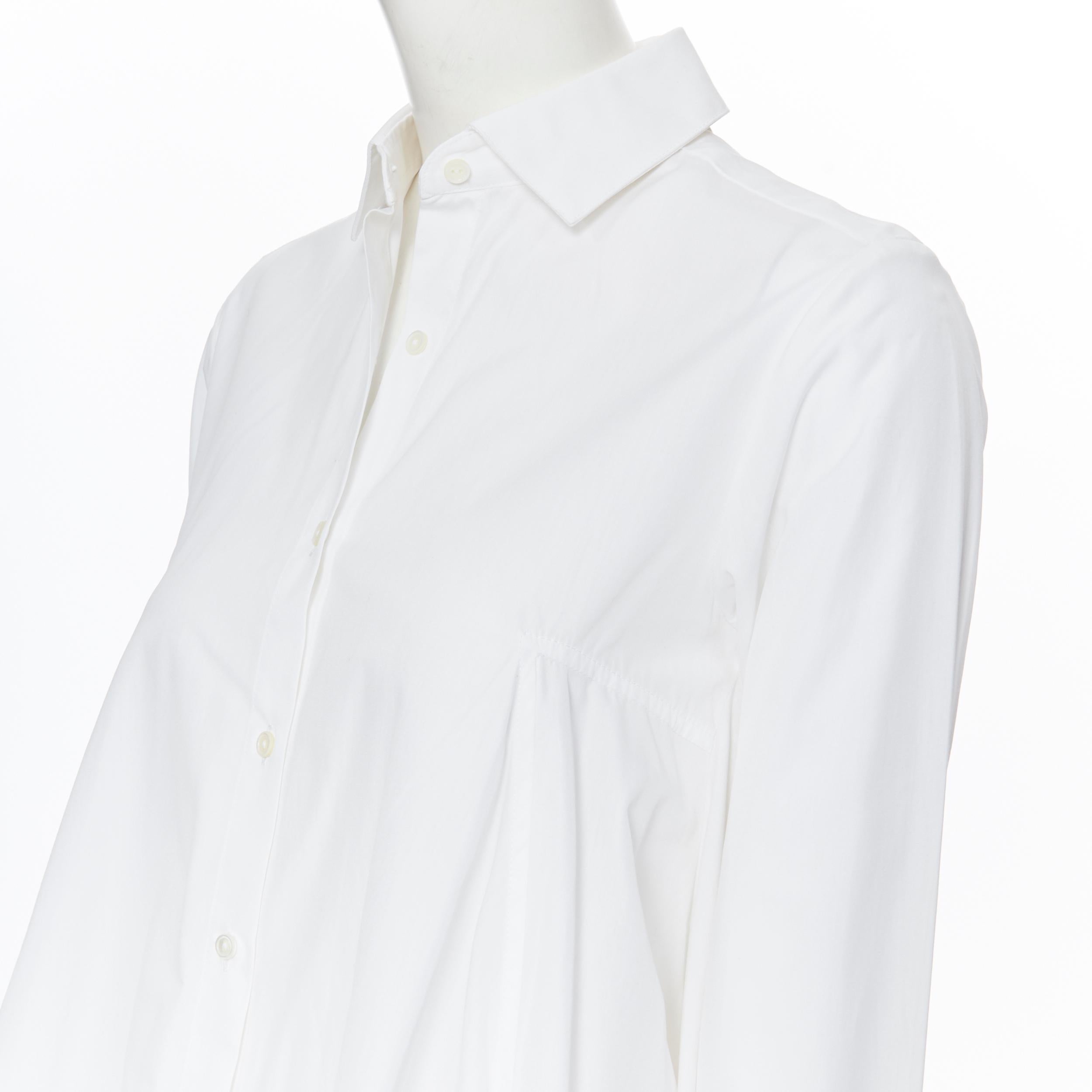 Palmer HARDING camicia in cotone bianco con orlo a cascata alto e drappeggiato, con bottoni, UK6
Marchio: Palmer Harding
Nome del modello / Stile: Camicia in cotone
Materiale: Cotone
Colore: bianco
Modello: Tinta unita
Chiusura: bottone
Dettaglio