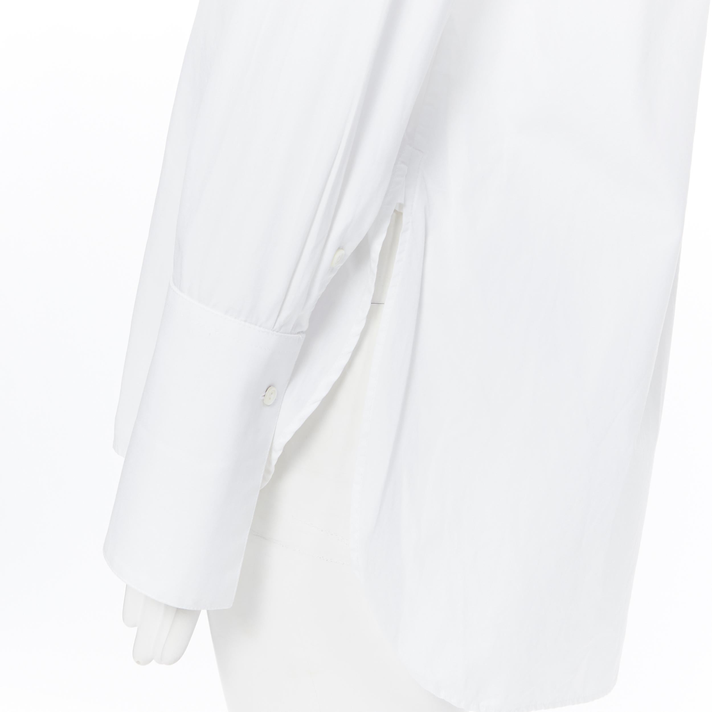 PALMER HARDING white cotton elongated cuff curvec hem oversized shirt UK8
Brand: Palmer Harding
Model Name / Style: Cotton shirt
Material: Cotton
Color: White
Pattern: Solid
Closure: Button
Extra Detail: Stiffen collar and cuff. Curved hem. Long