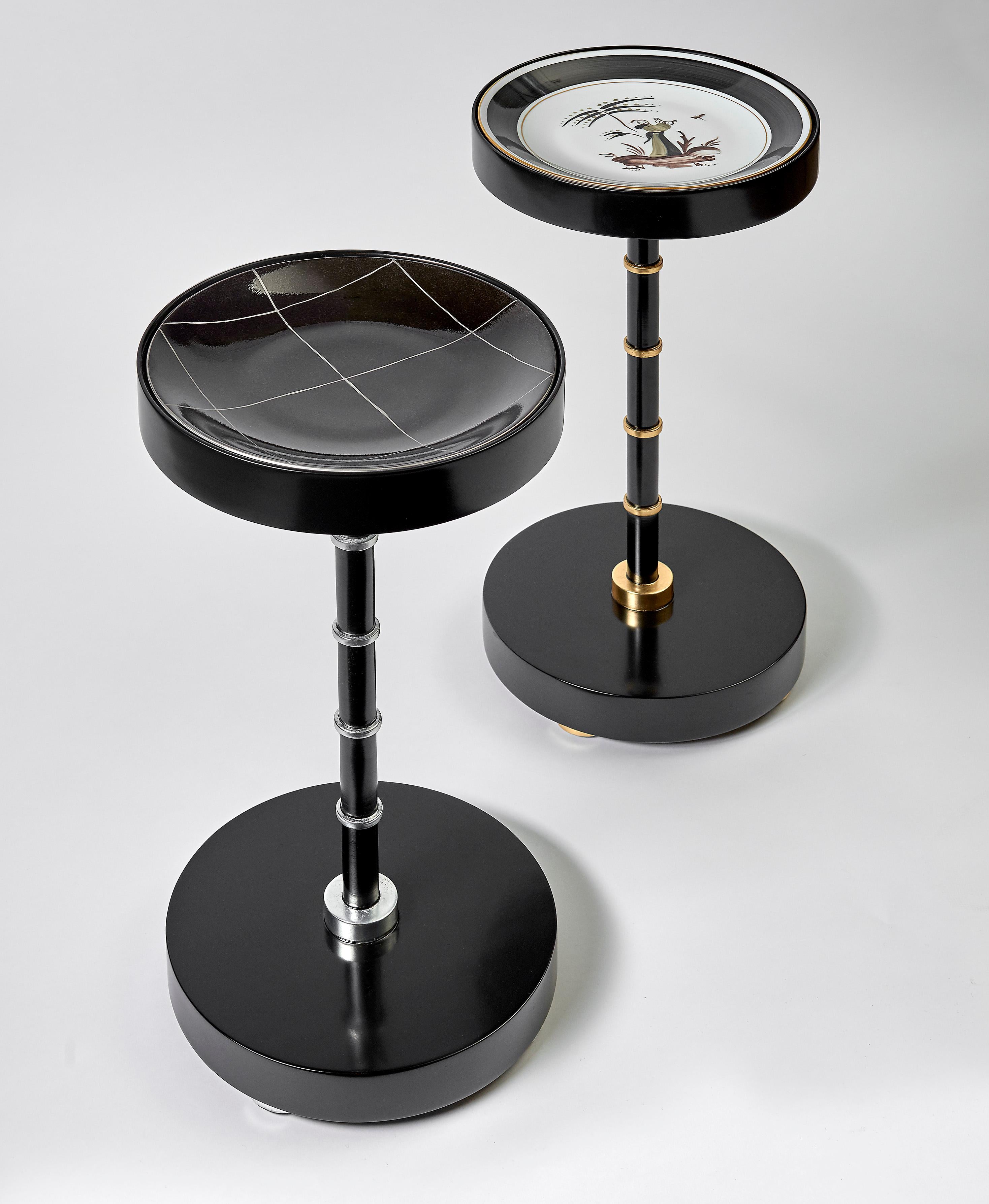 Palmer plate table/ round side table with porcelain plate and gold leaf detail
Dimensions: 11” diameter X 22” height.
Finish: Black lacquered
Detail finish: Gold leaf or silver leaf.
Hand made in Chicago by top craftsmen.
 