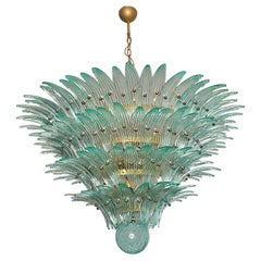 Palmette Deckenleuchte - vier Ebenen, 160 türkisfarbene Gläser