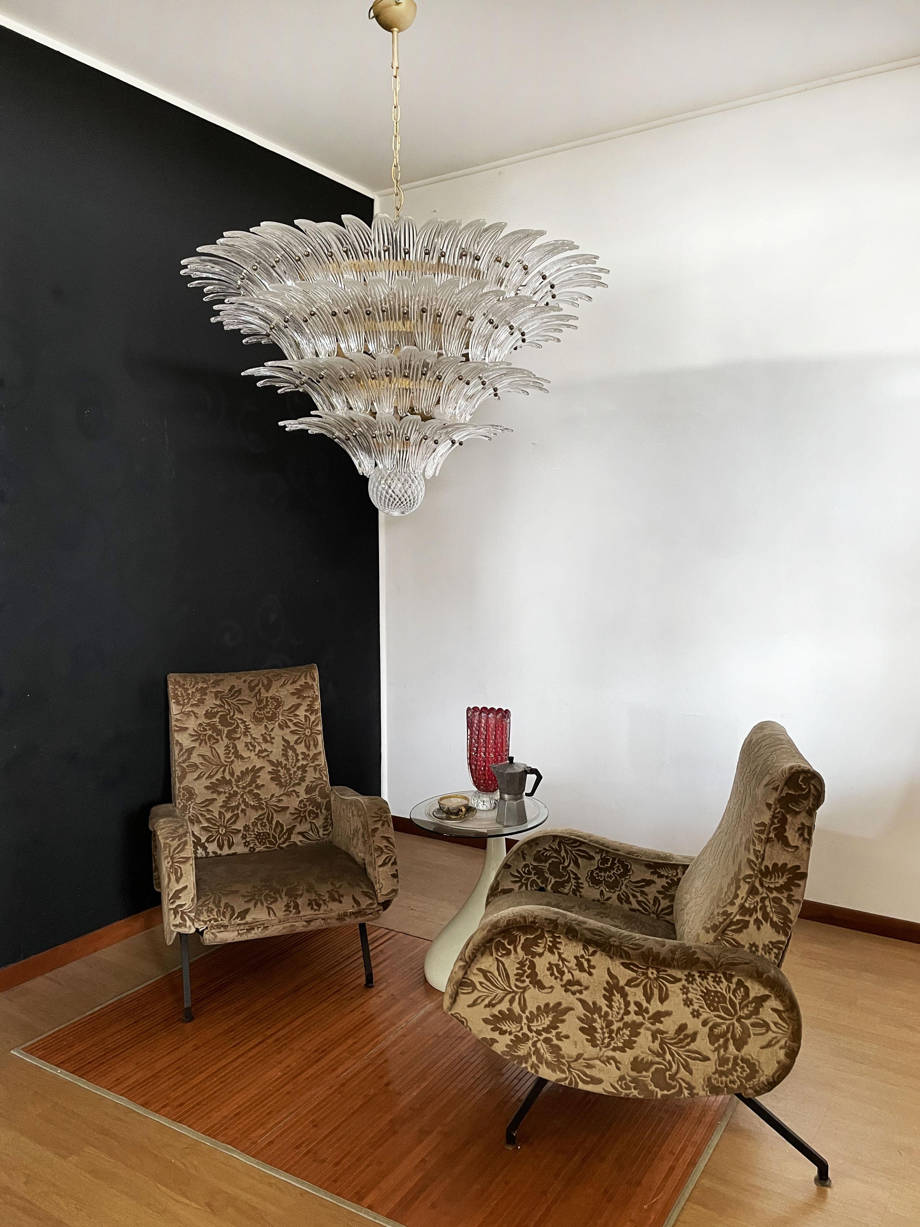 Palmette ceiling light made by 163 Murano trasparent glasses in a gold metal frame. Murano blown glass in a traditional way. Structure in gold colored metal.
Period:	1980's
Dimensions: 55.10 inches (140cm) height with chain; 31.50 inches (80 cm)