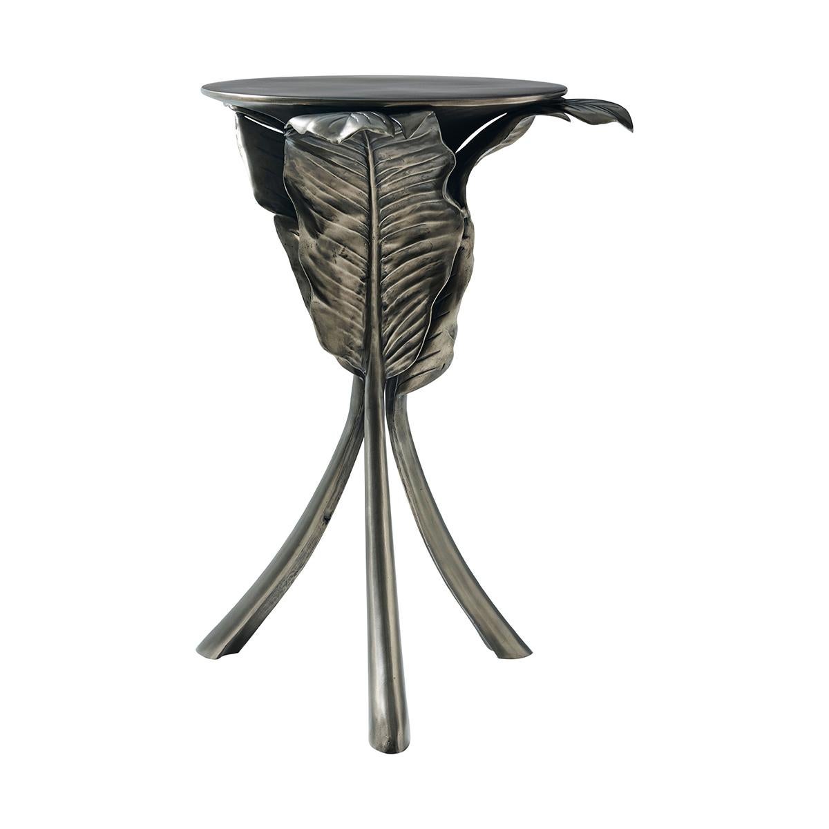 An artful blend of form and function, is a stunning sculptural statement piece. Depicting the natural elegance of banana leaves, this piece is hand cast and finished in the Volcanic finish.

Dimensions: 17